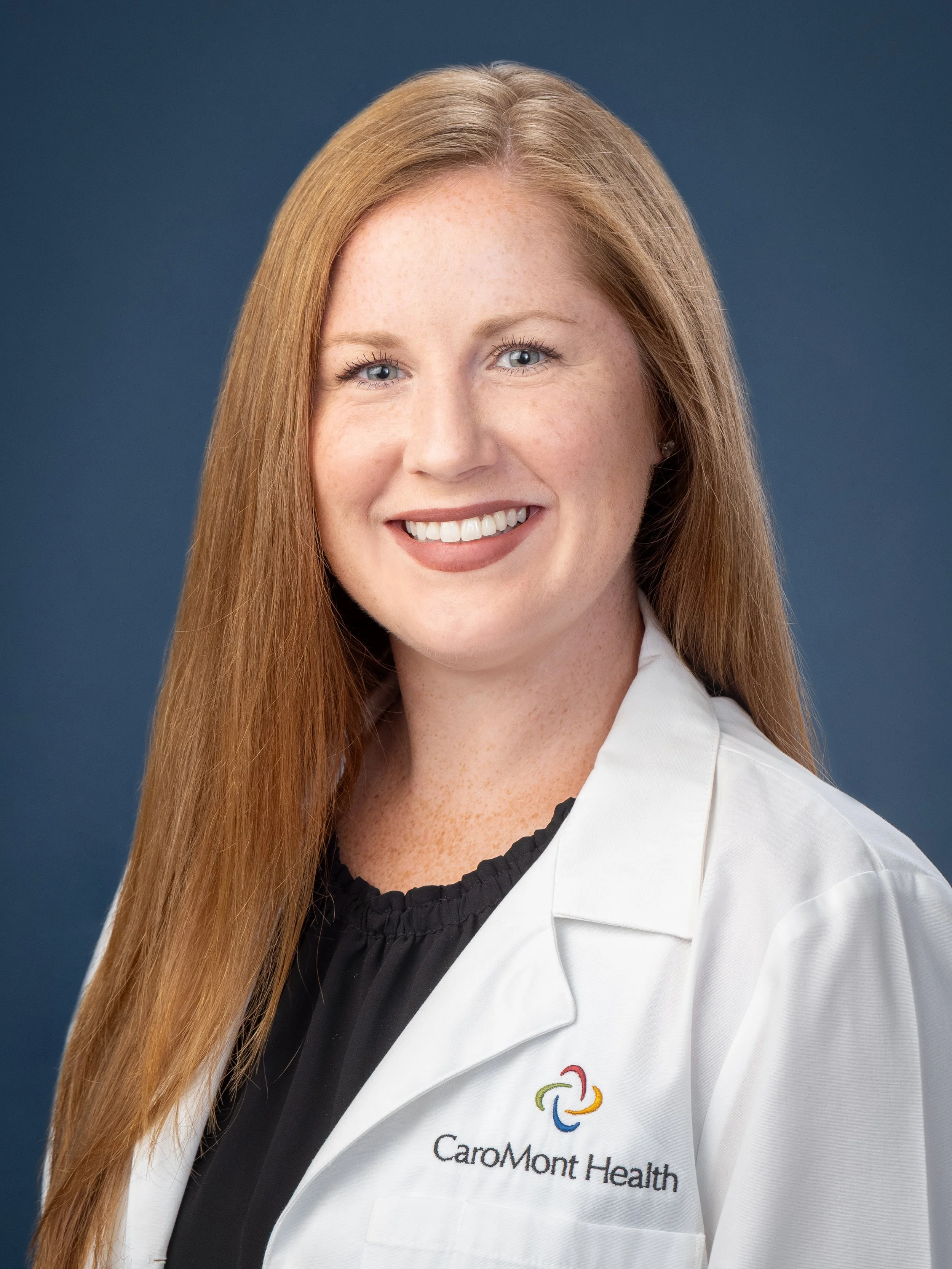 FY26_Headshot_Monroe_Margaret_White Coat.jpg
