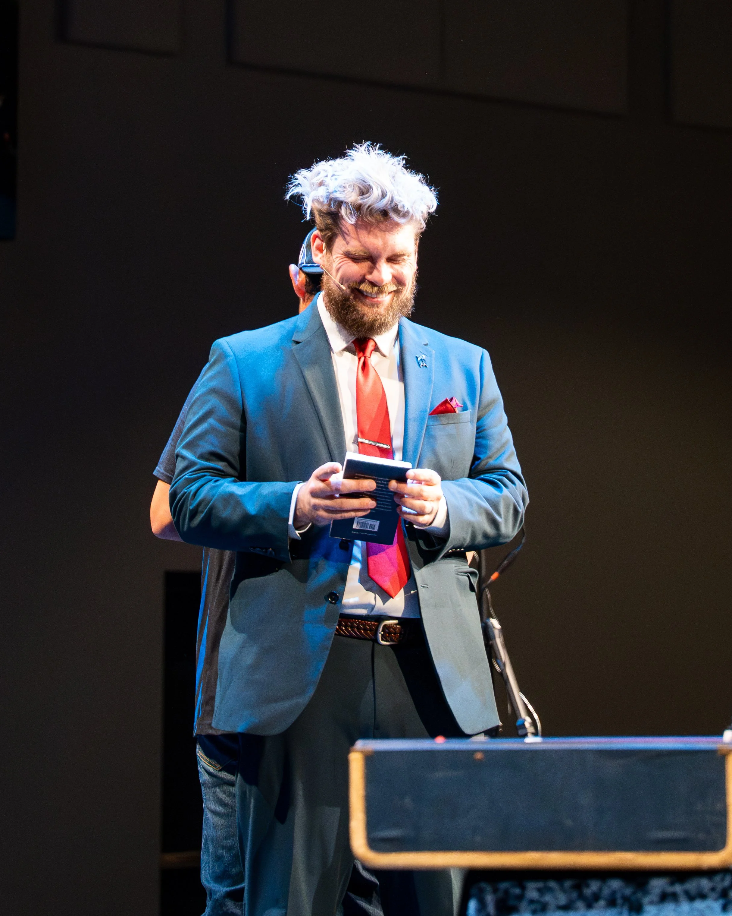 Matt Howard performing close-up magic at a Dallas corporate event