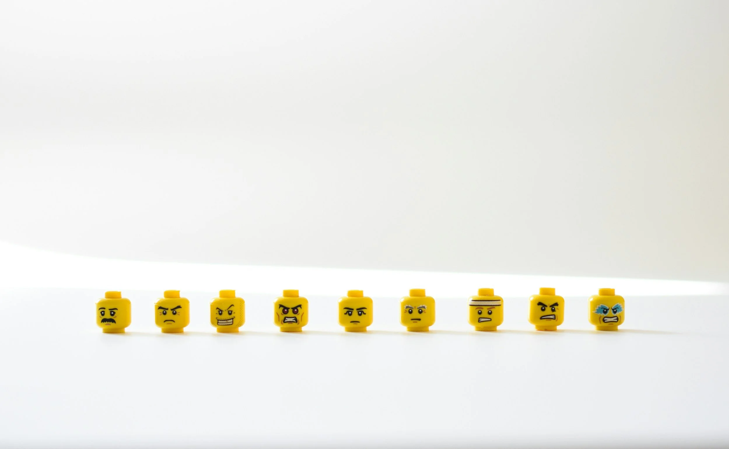 lego heads with angry faces