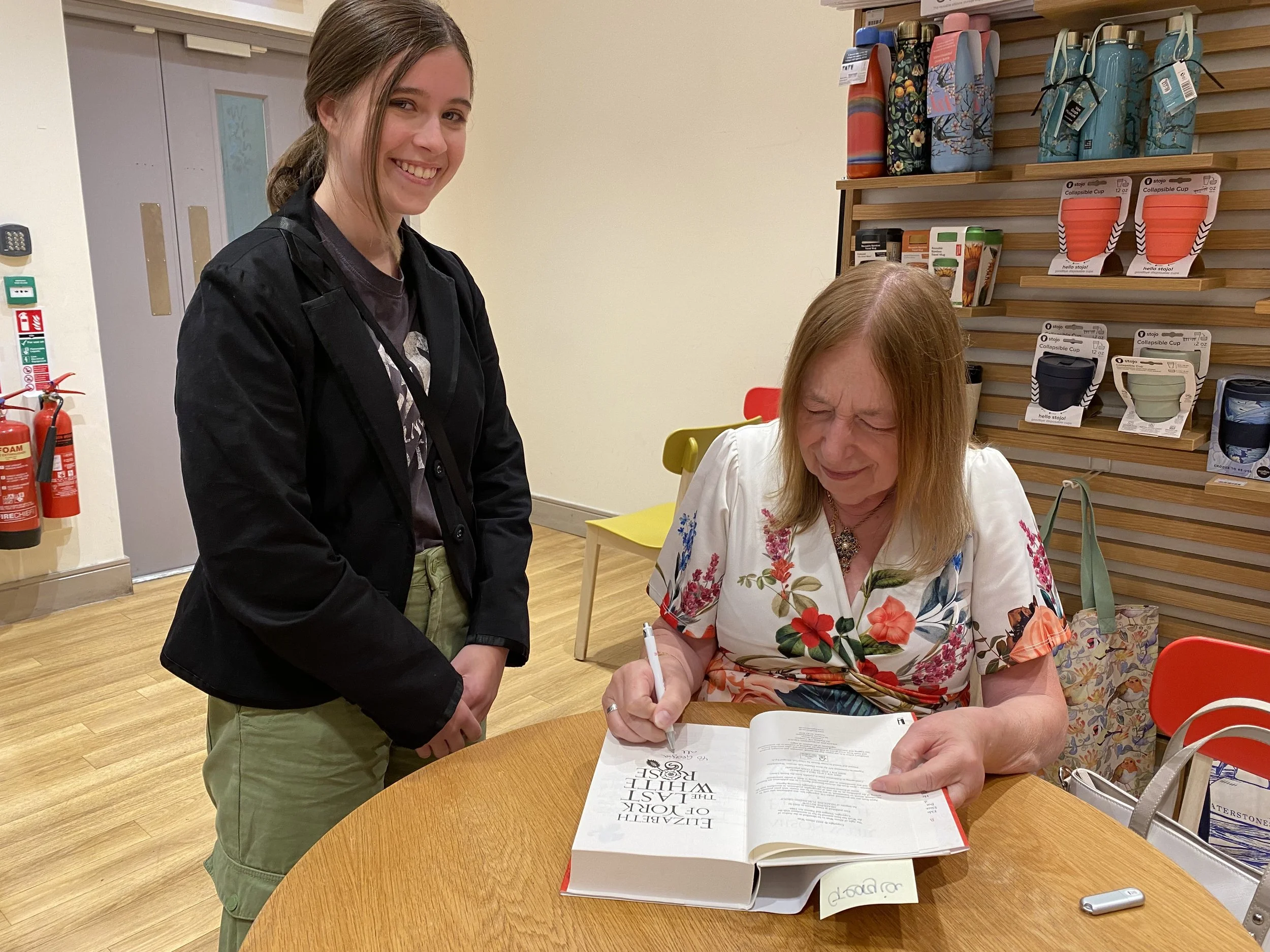 Young reporter getting her book signed by Alison Weir
