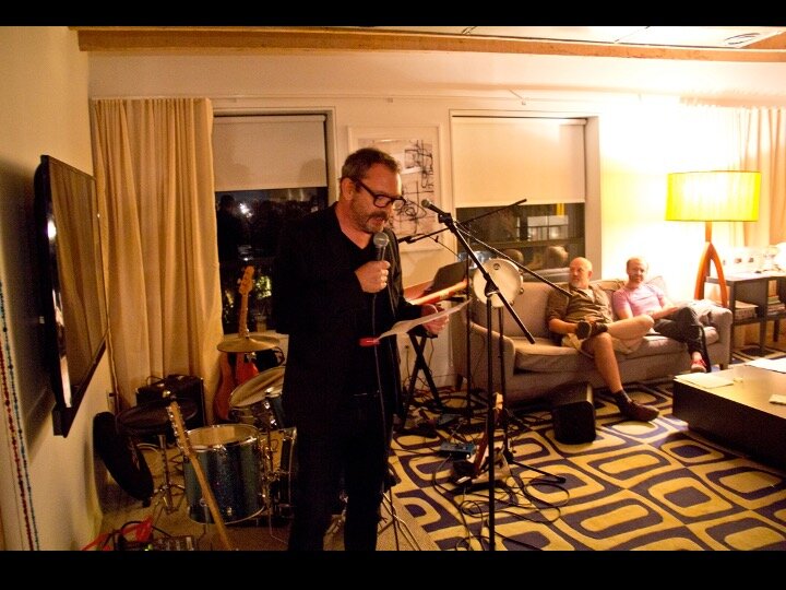 Liam Gillick performing script at Benefit Event