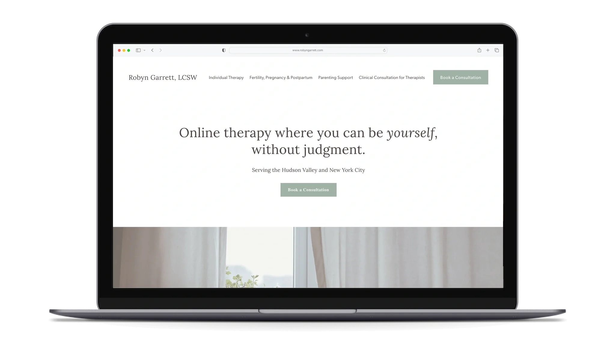 Laptop mockup of the Robyn Garrett, LCSW website, designed by Rebecca Eisner