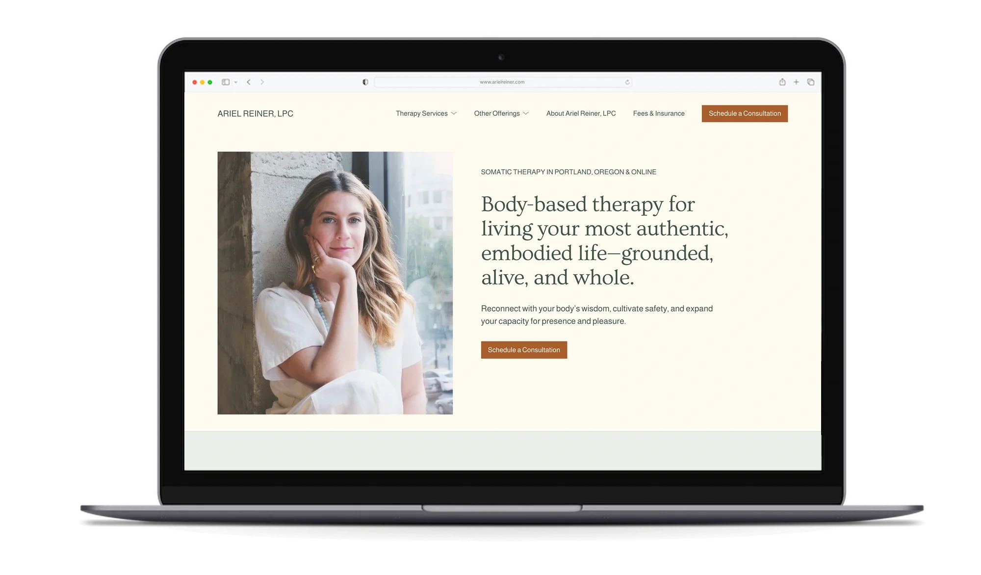 Laptop mockup of the Ariel Reiner, LPC website, designed by Rebecca Eisner