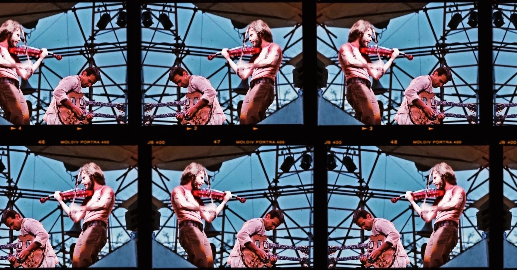 Four images of two musicians performing on a stage with a blue sky background, one playing a violin and the other playing a guitar, arranged in a grid pattern.