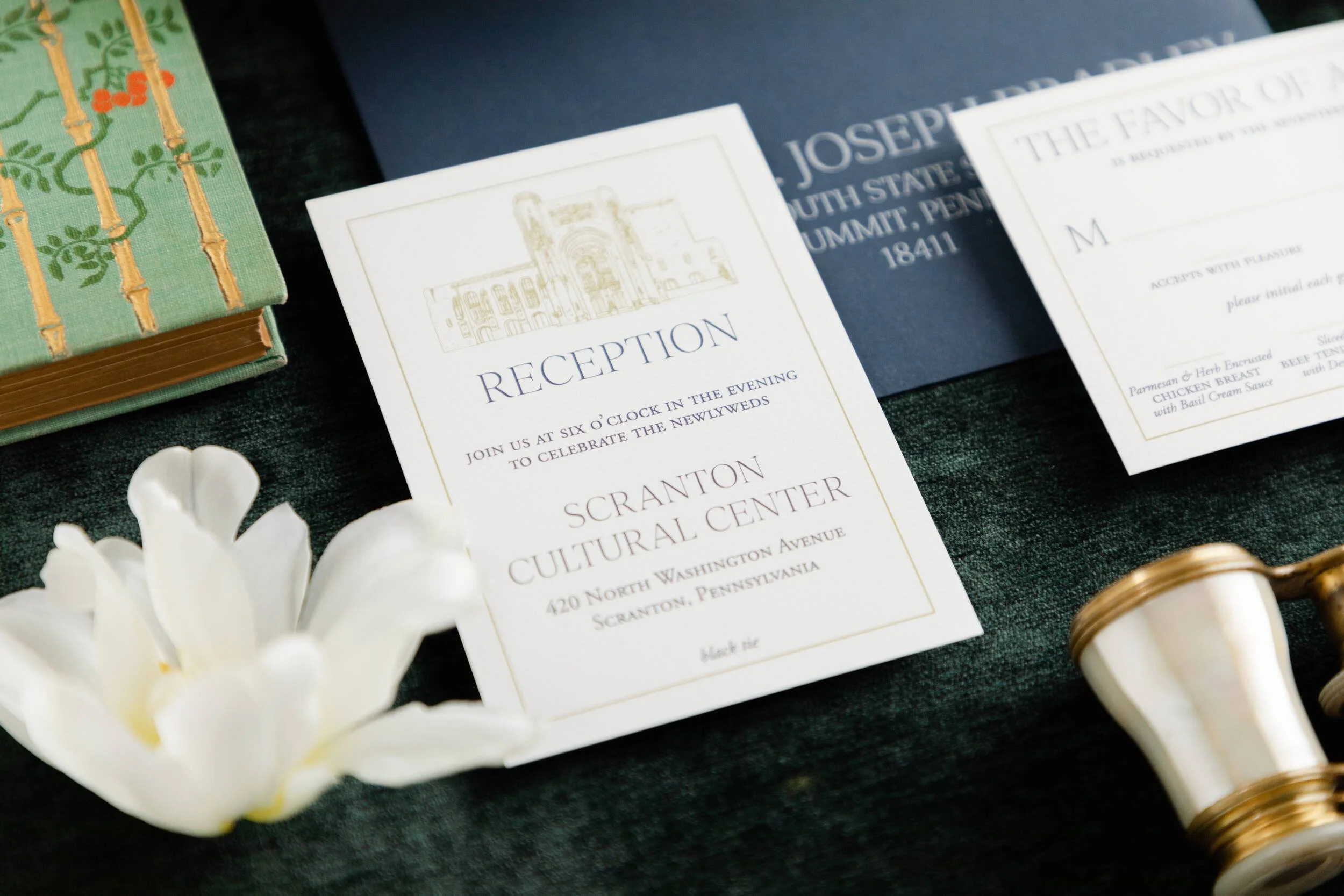 navy and gold wedding invitation with wedding venue illustration