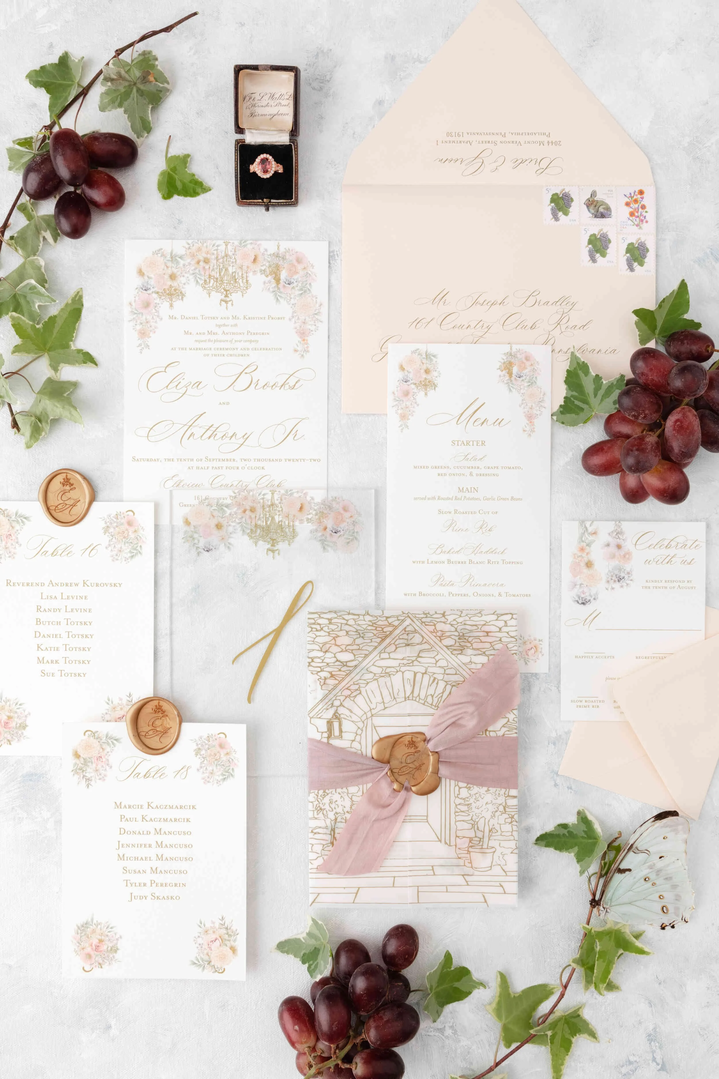 pastel floral wedding invitation with custom vellum gatefold wrap, silk ribbon, and custom wax seal.