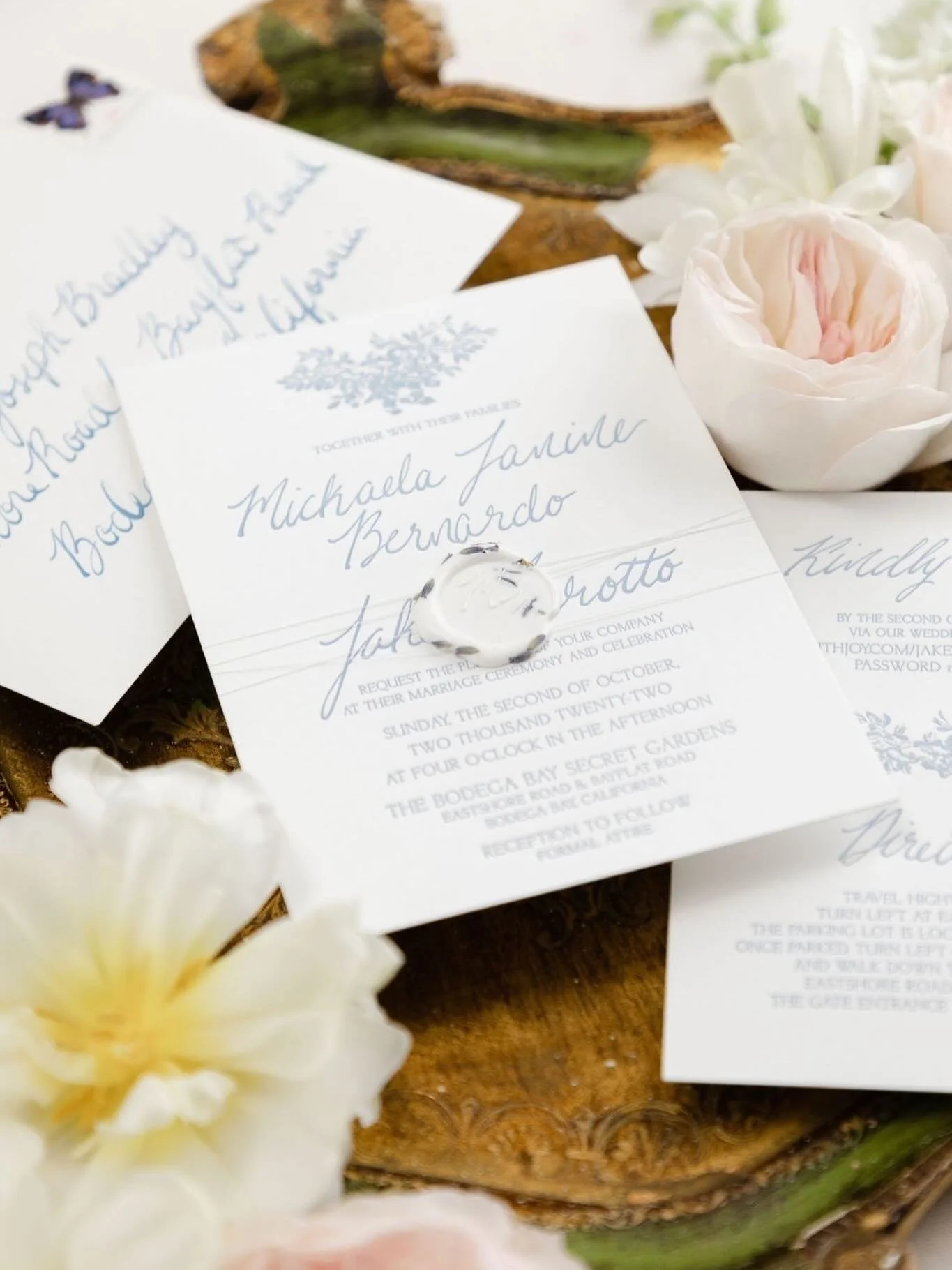 The classic Roma invitation looking super romantic in a stunning lavender blue letterpress color, with delicate white thread and white wax seal pressed with real lavender petals. Paired with calligraphy addressing to finish this luxury semi-custom su