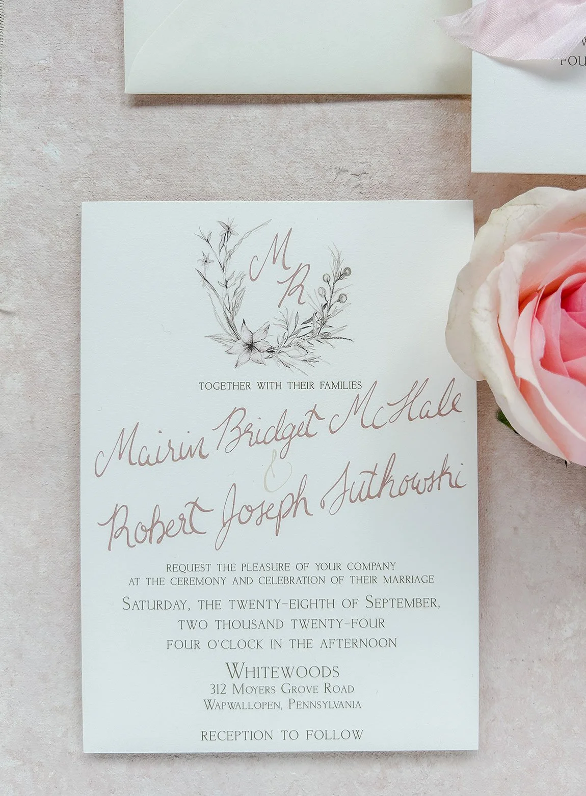 Pink-floral-monogram-wedding-invitation.jpg
