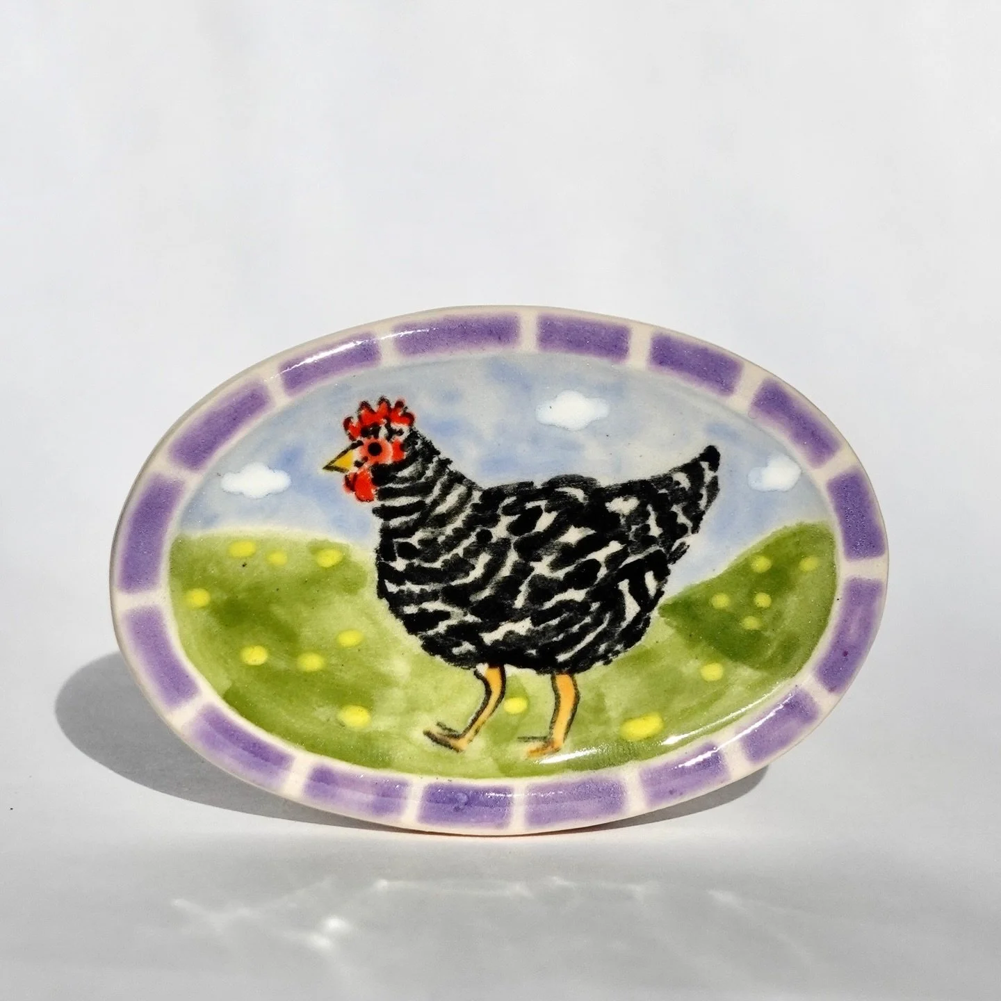 How life feels now that the weathers been above 50 degrees ☀️ lil hen marching into spring 
.
.
.
.
#handmadeceramics #cuteceramics #fridgemagnet #ceramicarts #underglaze