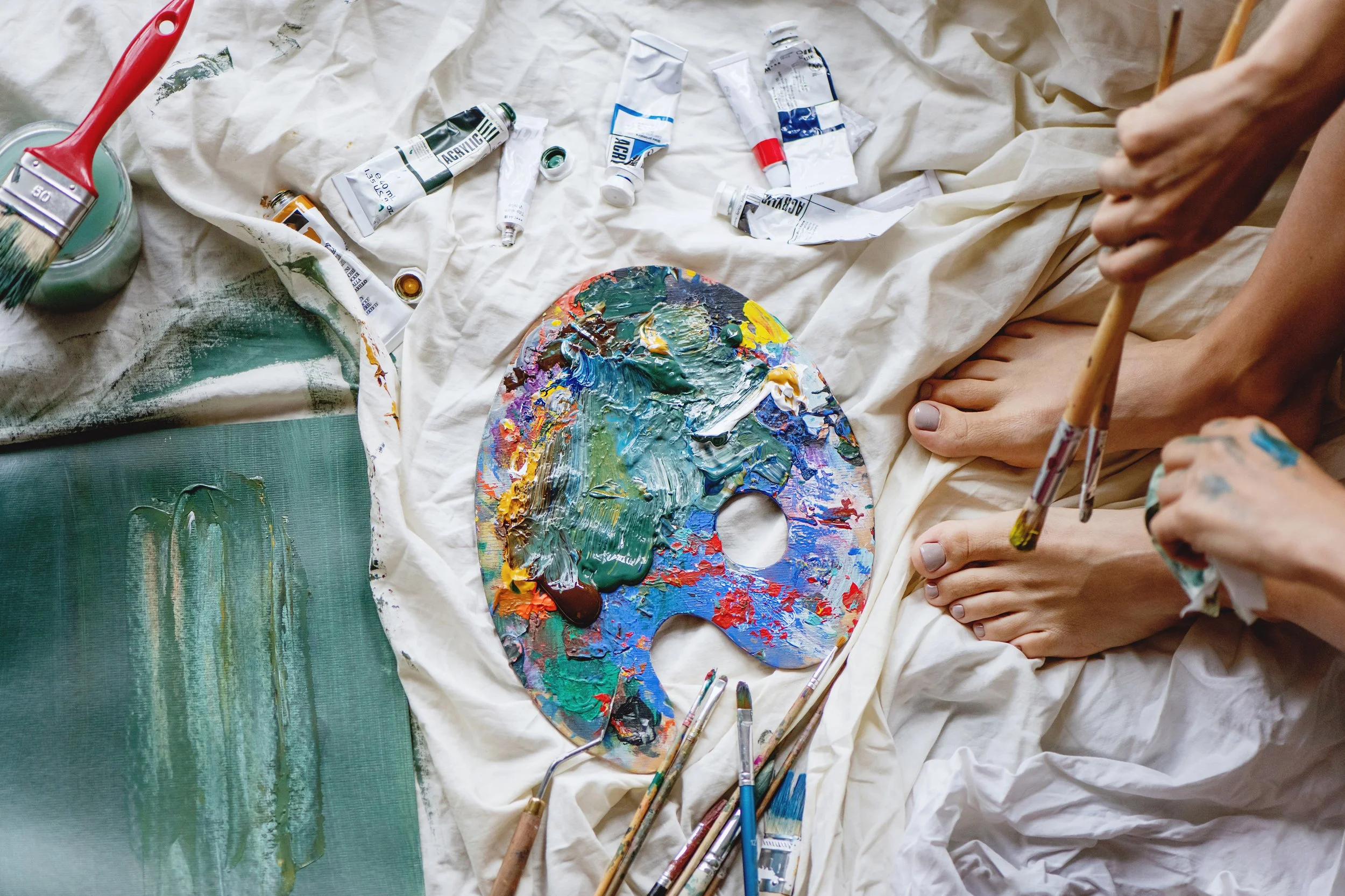 painting a canvas with acrylicpaint