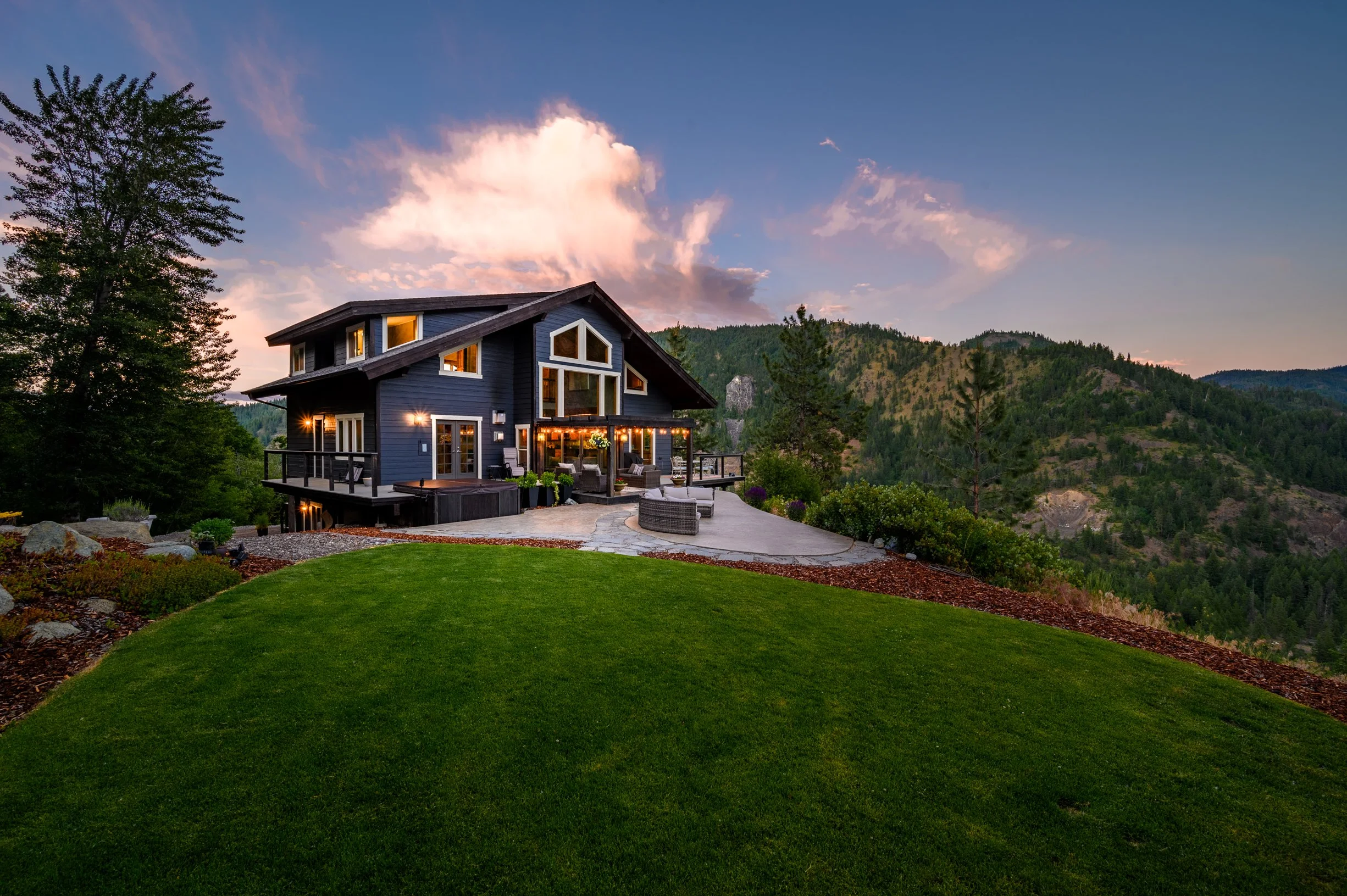 exterior_twilight_sunset_photos_listing_12300_ingalls_creek_rd_mountain__custom_home_claridge_media-23.jpg