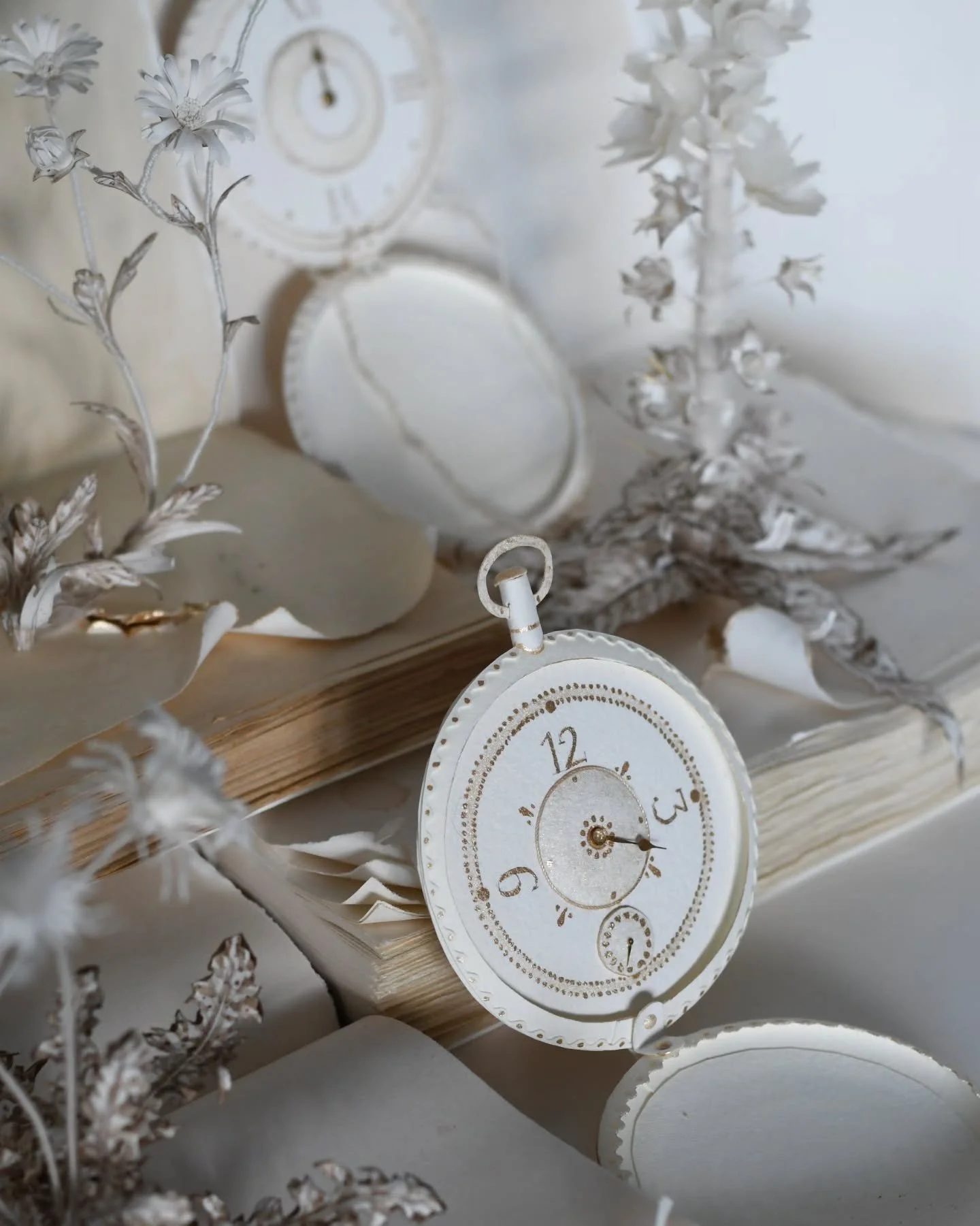 Keeping time and making stories and gardens with paper. It's the story of my life really. 
Little glimmers of gold leaf and gold paint are tiptoeing in, representing light and fleeting moments. I've recently added the most beautiful gold paints to my