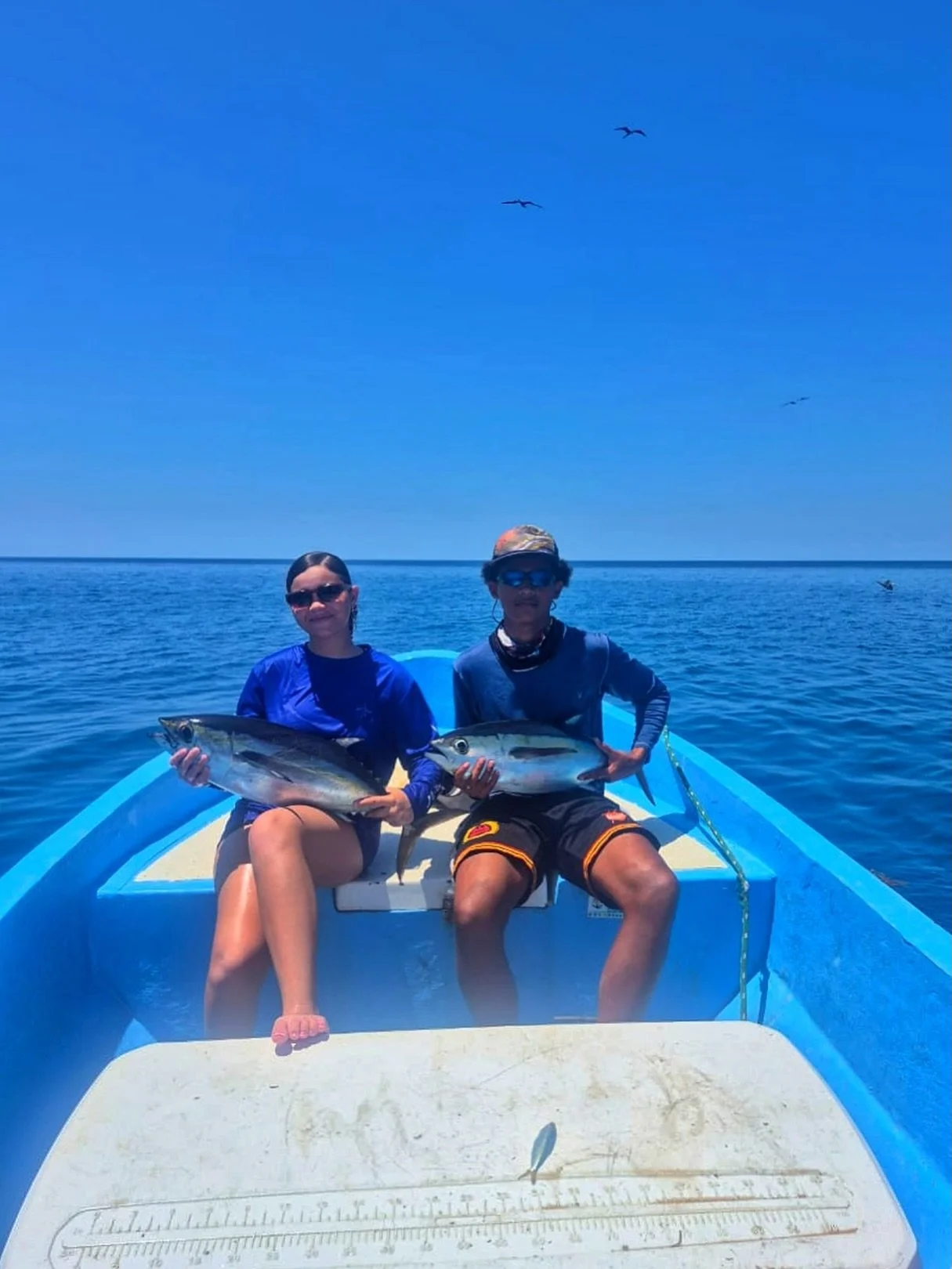 The birds aren&rsquo;t the only ones aiming for the bait schools&mdash;#MissJesslin&rsquo;s crew also went two-for-two on tunas. ✔️ Kudos to Jesslin and Peder Cabral for these fatties in Southern #Belize with Capt. Warren Cabral! 🍣 

📸: @warren.cab