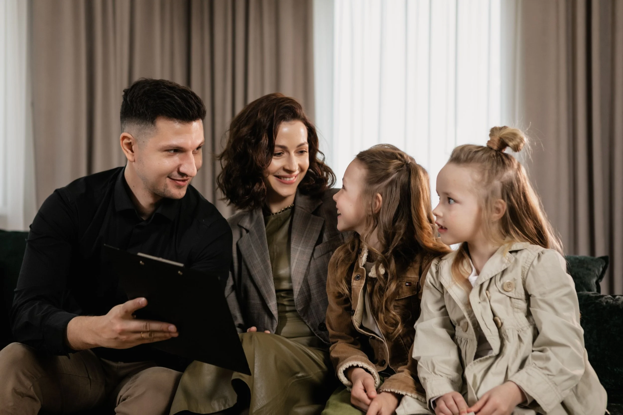 Family reviewing a household schedule together.