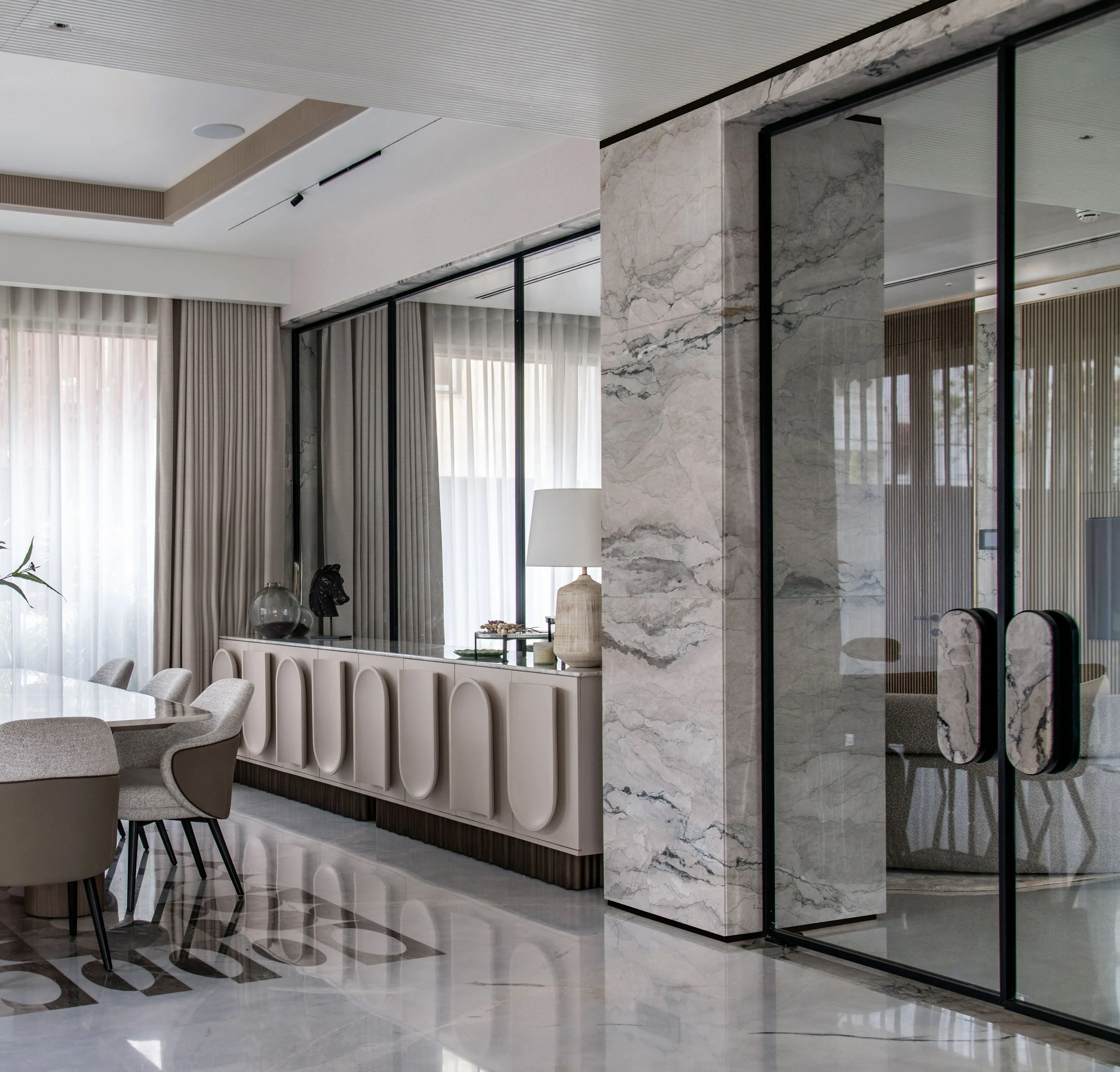 Modern dining room with elegant furnishings and an open, functional layout.
