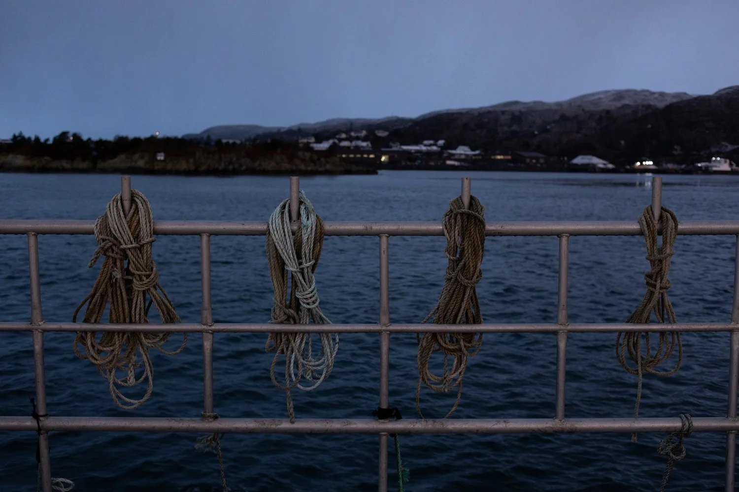 Ropes are tied to the side of a small-scale creel fishing vessel used to attach the creels to one another and to the buoy.