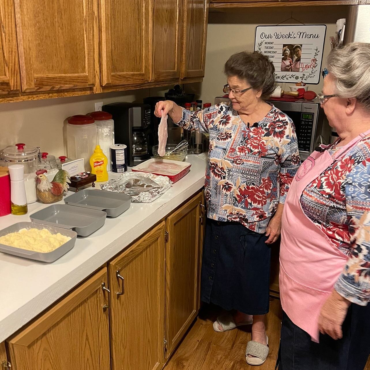 Mary and Linda getting ready to start the live show. You don&rsquo;t want to miss this delicious fried catfish.