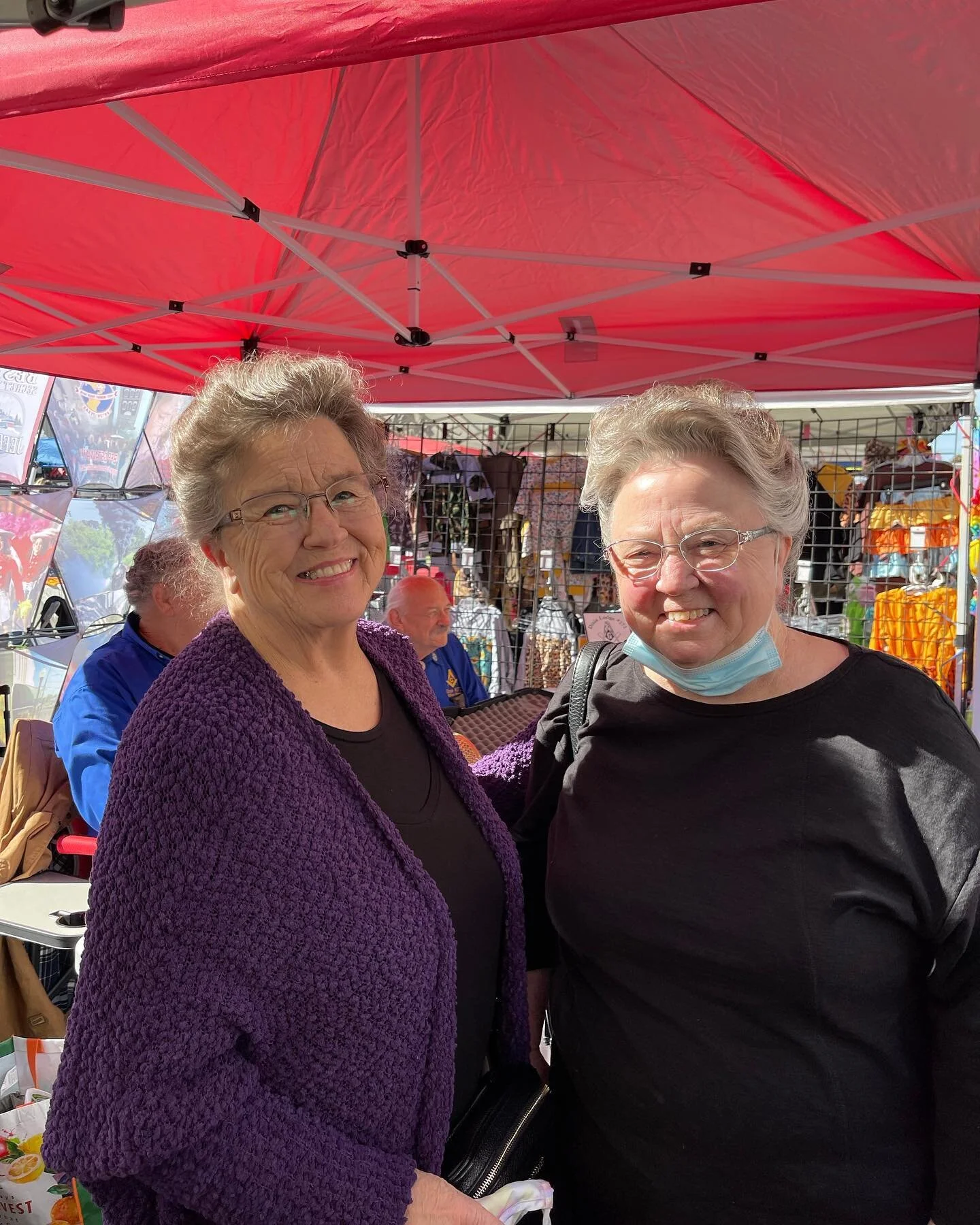 The sisters enjoying the Syrup festival in Henderson this morning.