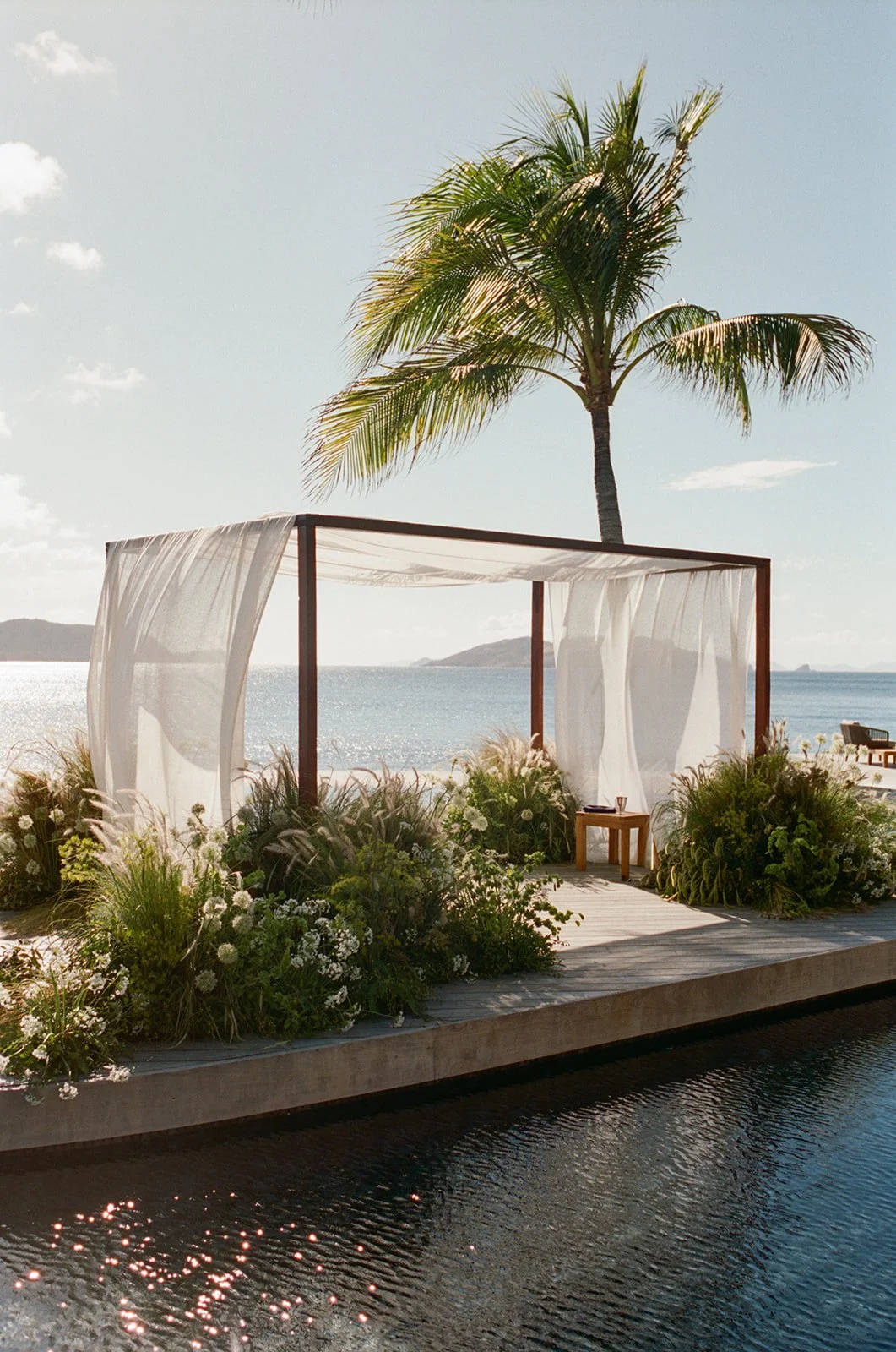 Beach side wedding ceremony in St. barth planned by L. Scott Events featured in Vogue and Who What Wear