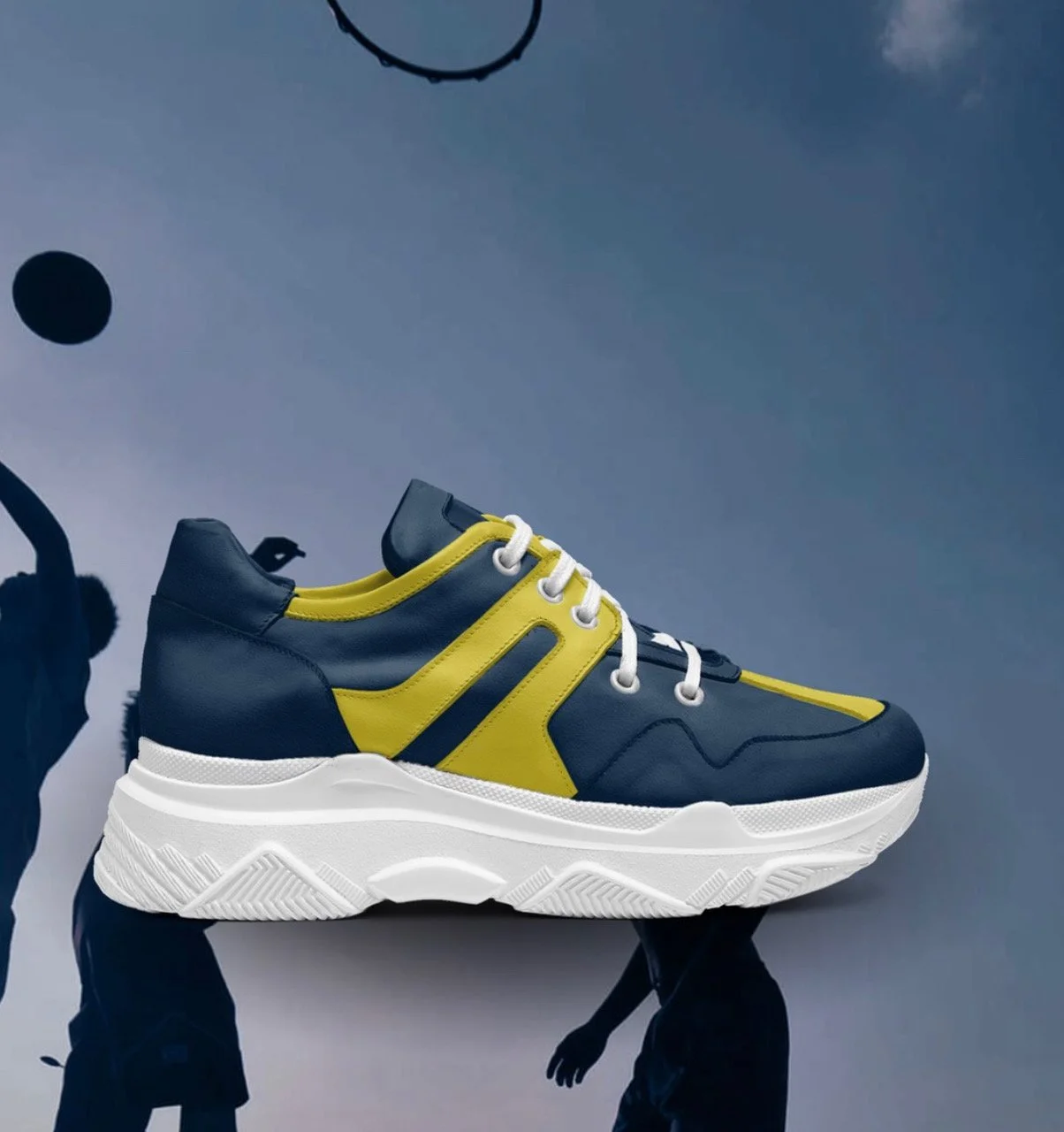 This sporty sneaker is meant to trigger creativity. The lace-up style presents a sculptural paneled design made from plush Italian leather and a massive pumped-up rubber sole. Turned profiles and the brand’s logo embedded on the tongue complement the