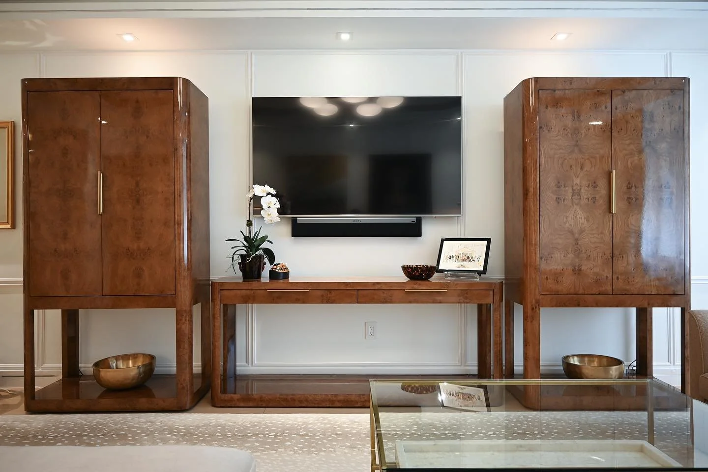Sutton Place
 
The glamorous Burl cabinets for the living room inspired the design for the rest of this New York City apartment. Warm brass metals paired with natural toned fabrics created spaces that feel both elevated and delightful. 

Featuring:
@