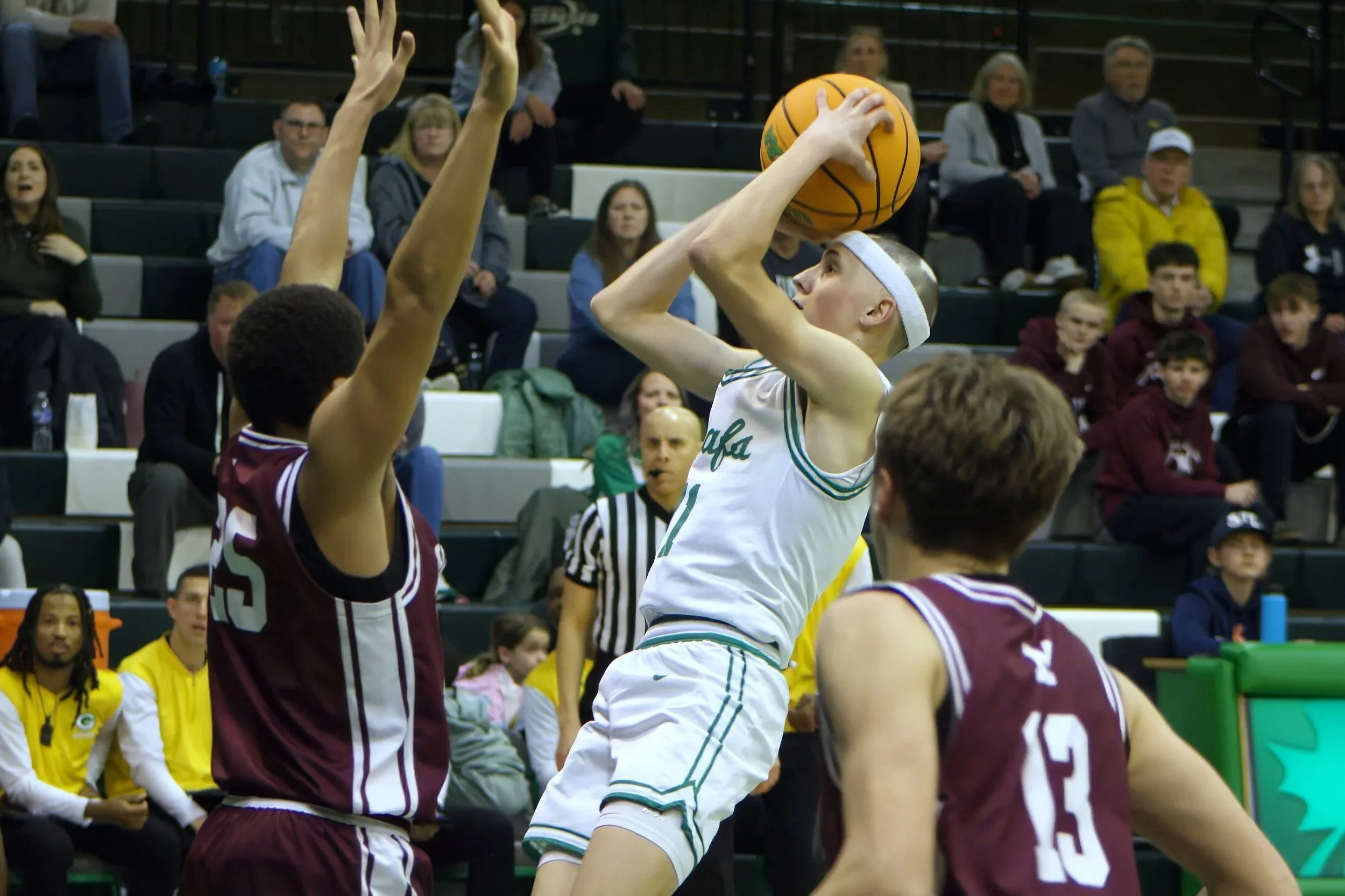 Basketball: Leafs Put Up A Battle Against Conference Leading Moline 