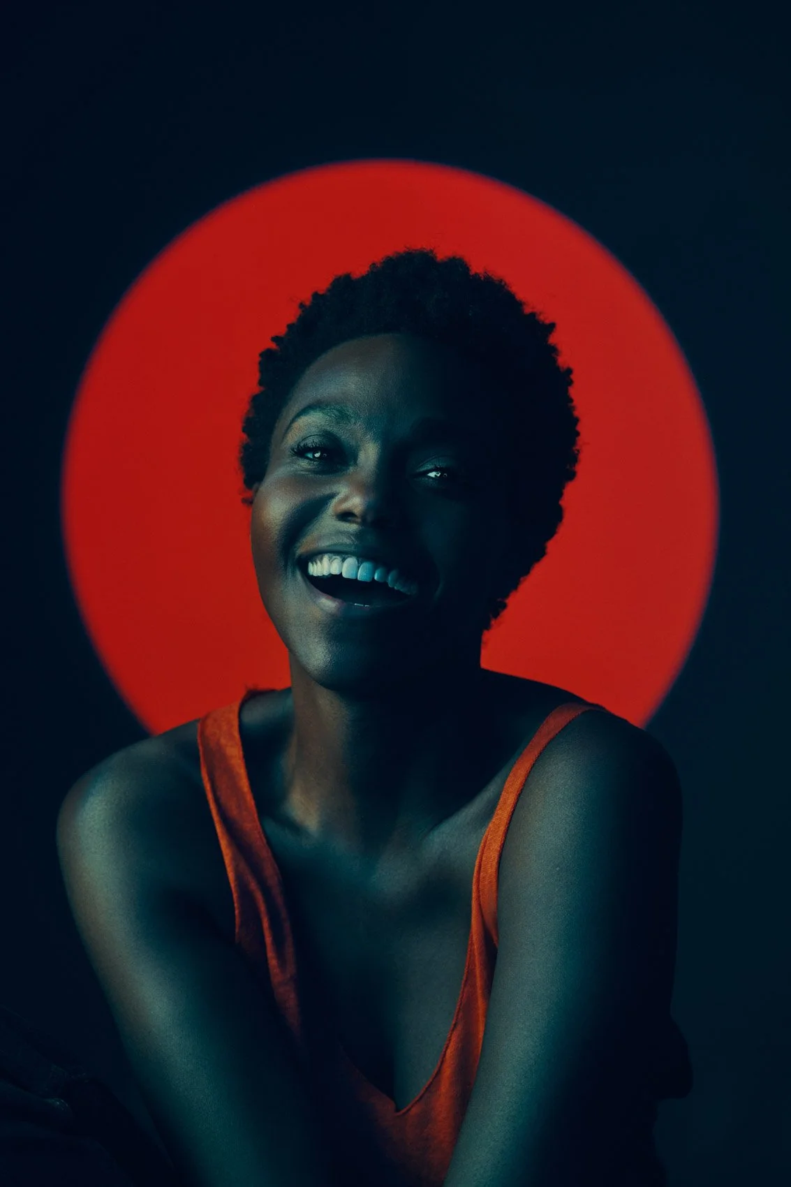 red-circle-backdrop-smiling-portrait-nashville-portrait-photographer-jeremy-cowart.jpg