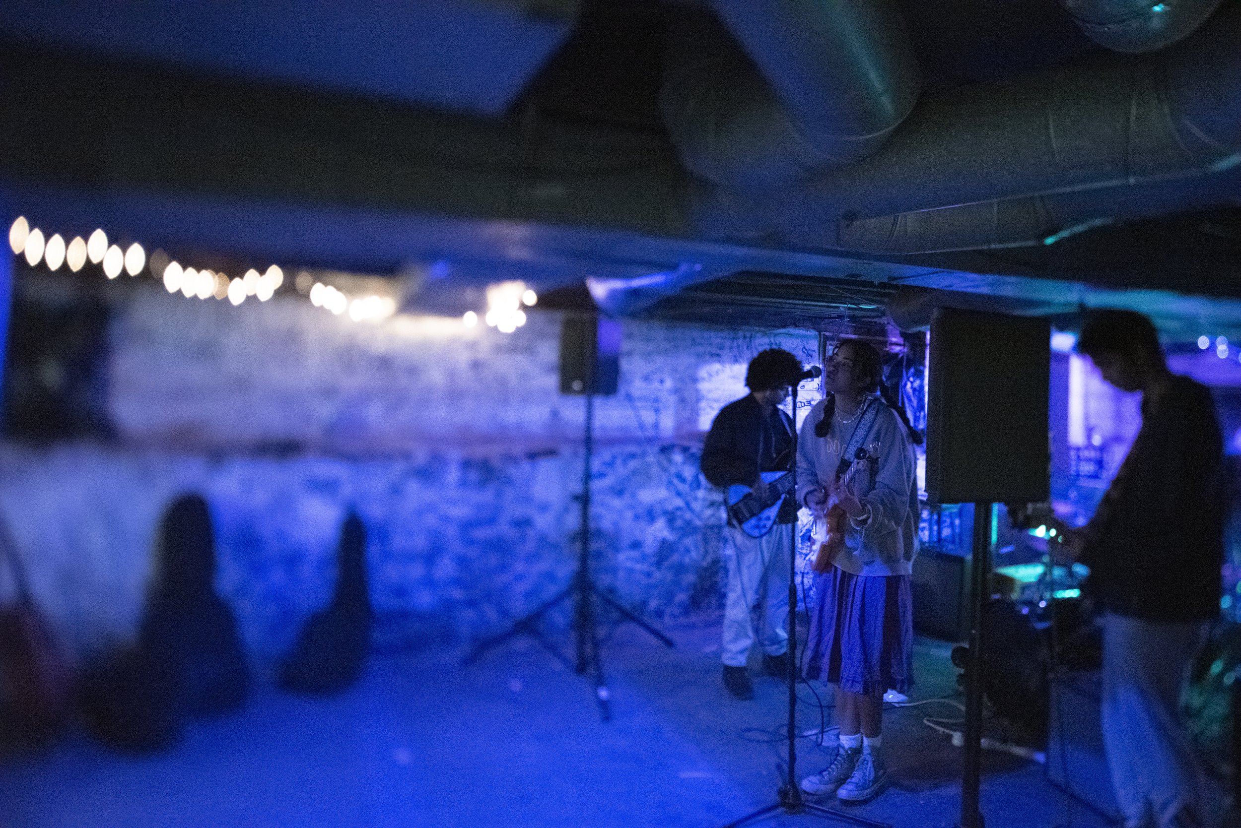 Lauren Juzang and her bandmates Anish and Vir during soundcheck. Artists arrive hours before the doors open to do one final soundcheck. April 2 2022, Syracuse NY.