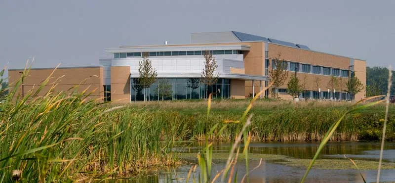 Exterior of Whitewater University Innovation Center with Pond.jpg