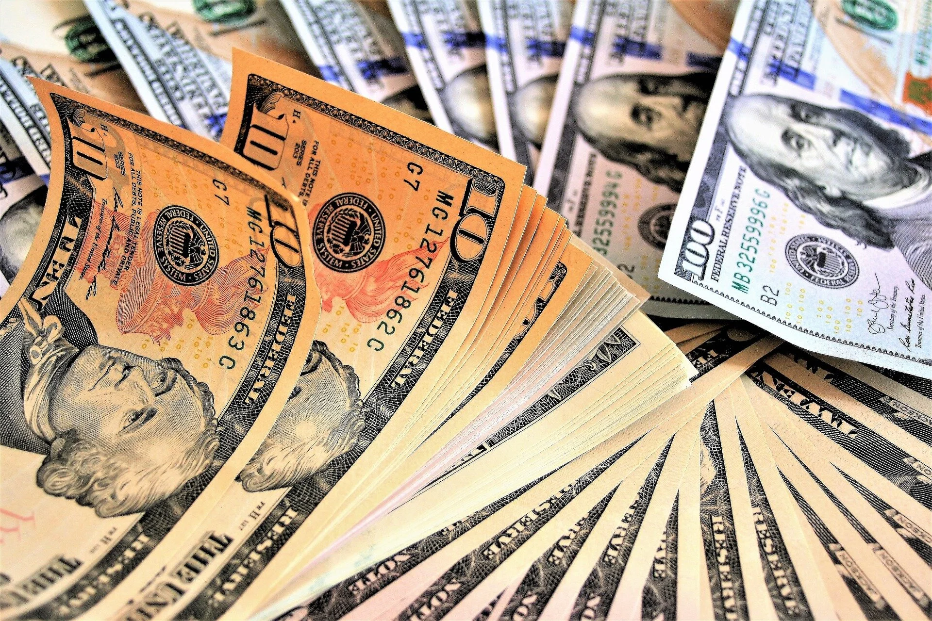 Bills of ten dollar and hundred dollar bills