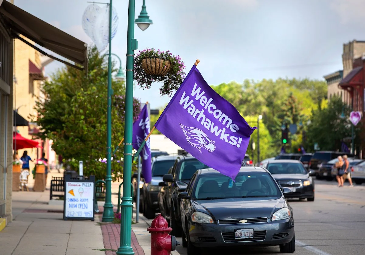 Welcome Warhawks Flag in Downtown Whtiewater