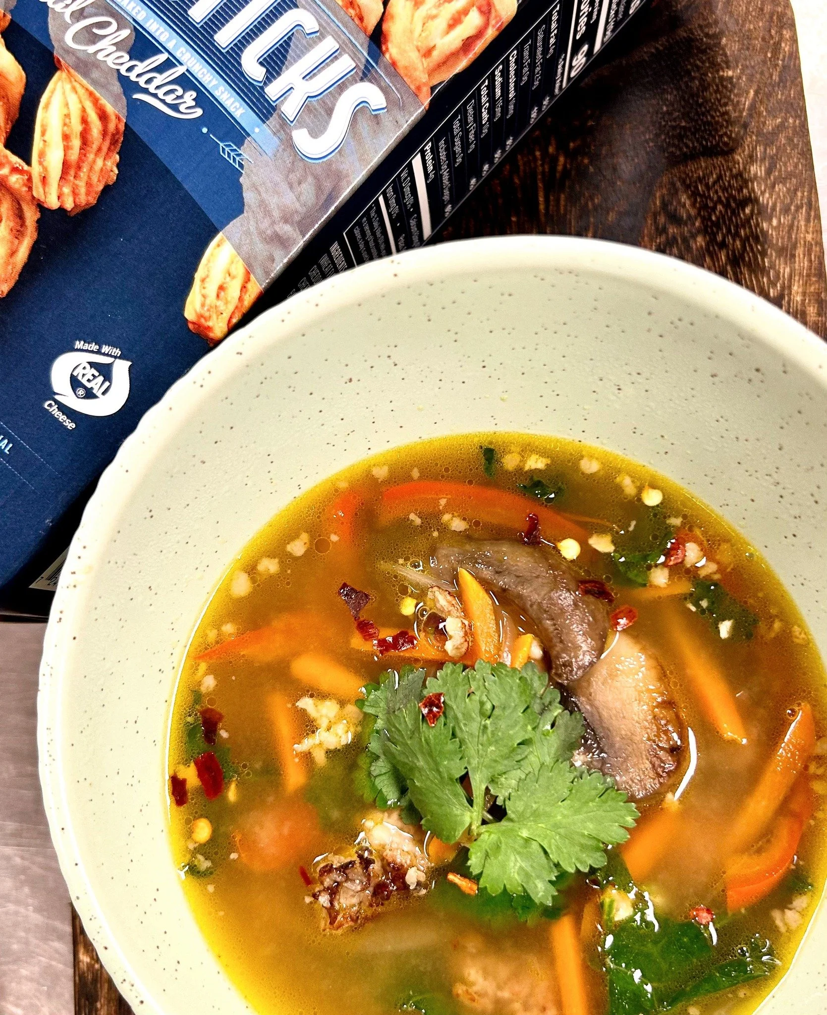 Today's soup is a rainbow of flavor! Miso and mushrooms lend it a punchy umami, while kale adds a peppery earthiness. Carrots sweeten the dish, red onion provides a bit of bite, and ginger adds a warming spice to the soup. Rounding it all out, Italia