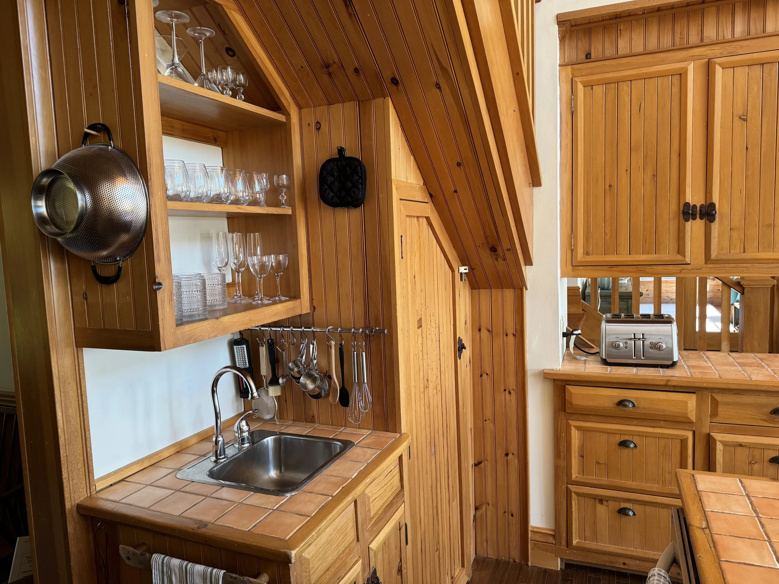 Bar sink, glasses, toast station