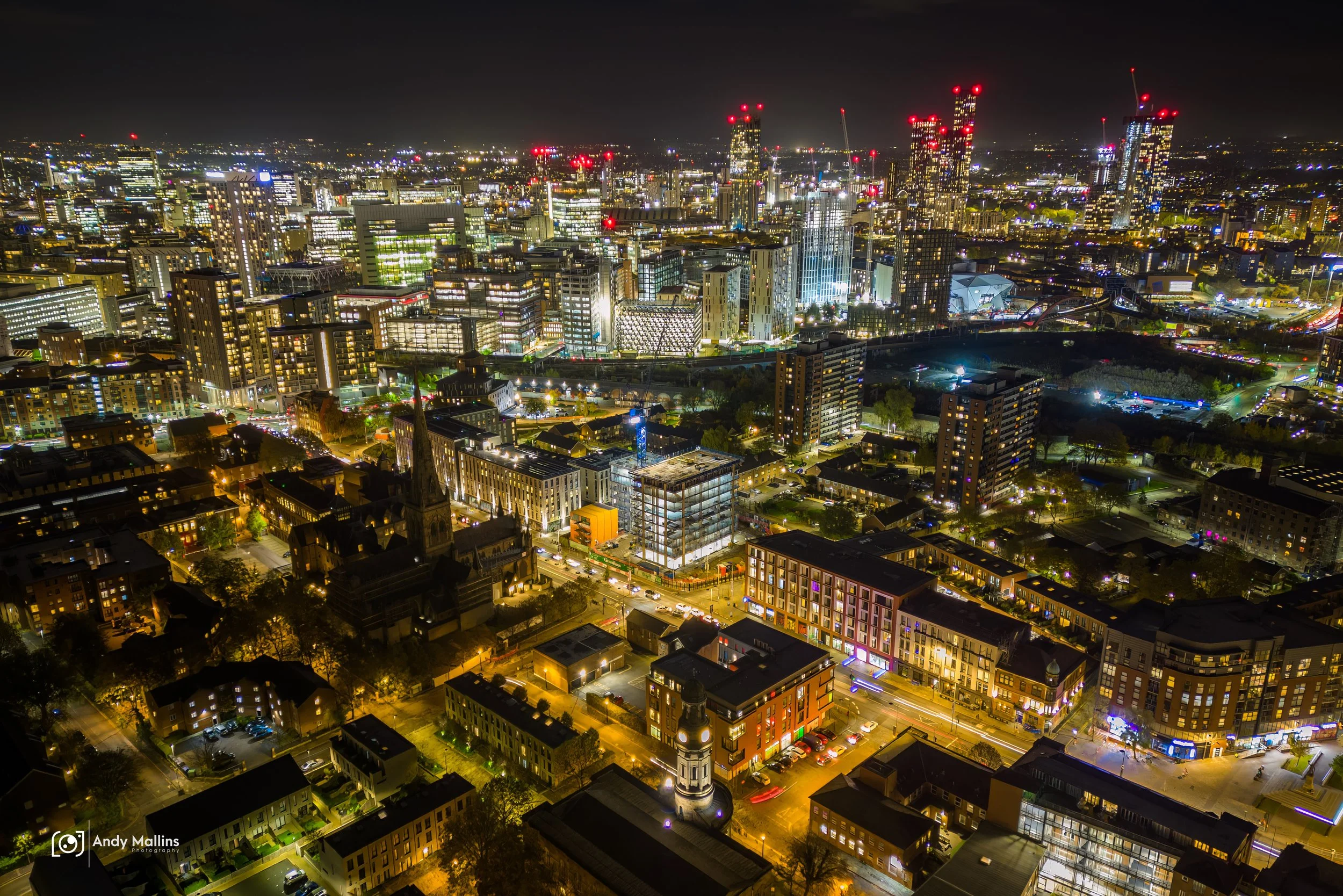 An aerial photo from Salford of Deansgate Square and the Manchester Skyline.