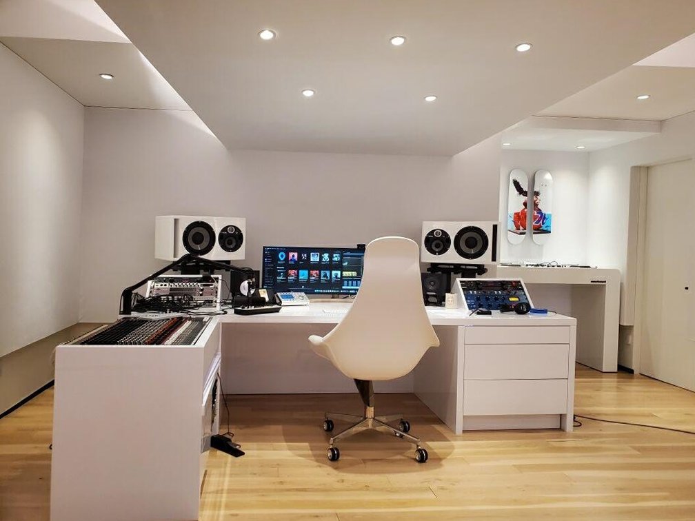 Stretched-Fabric Walls over Acoustic Treatment