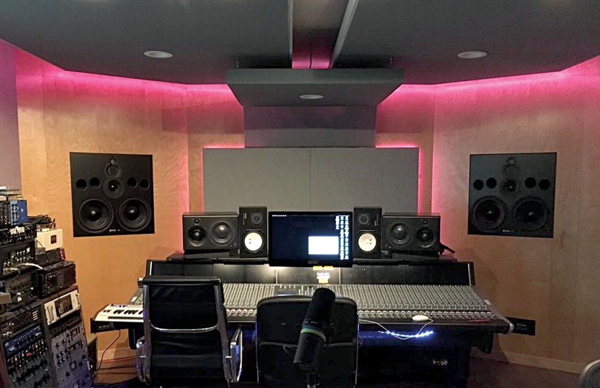 Stretched-Fabric Walls over Acoustic Treatment