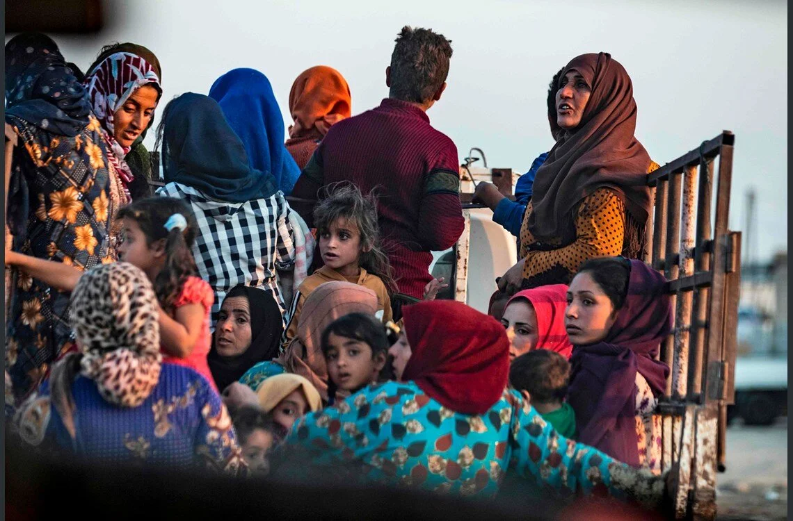 Kurdish refugees flee Turkish bombing. (Photo: Rudaw)