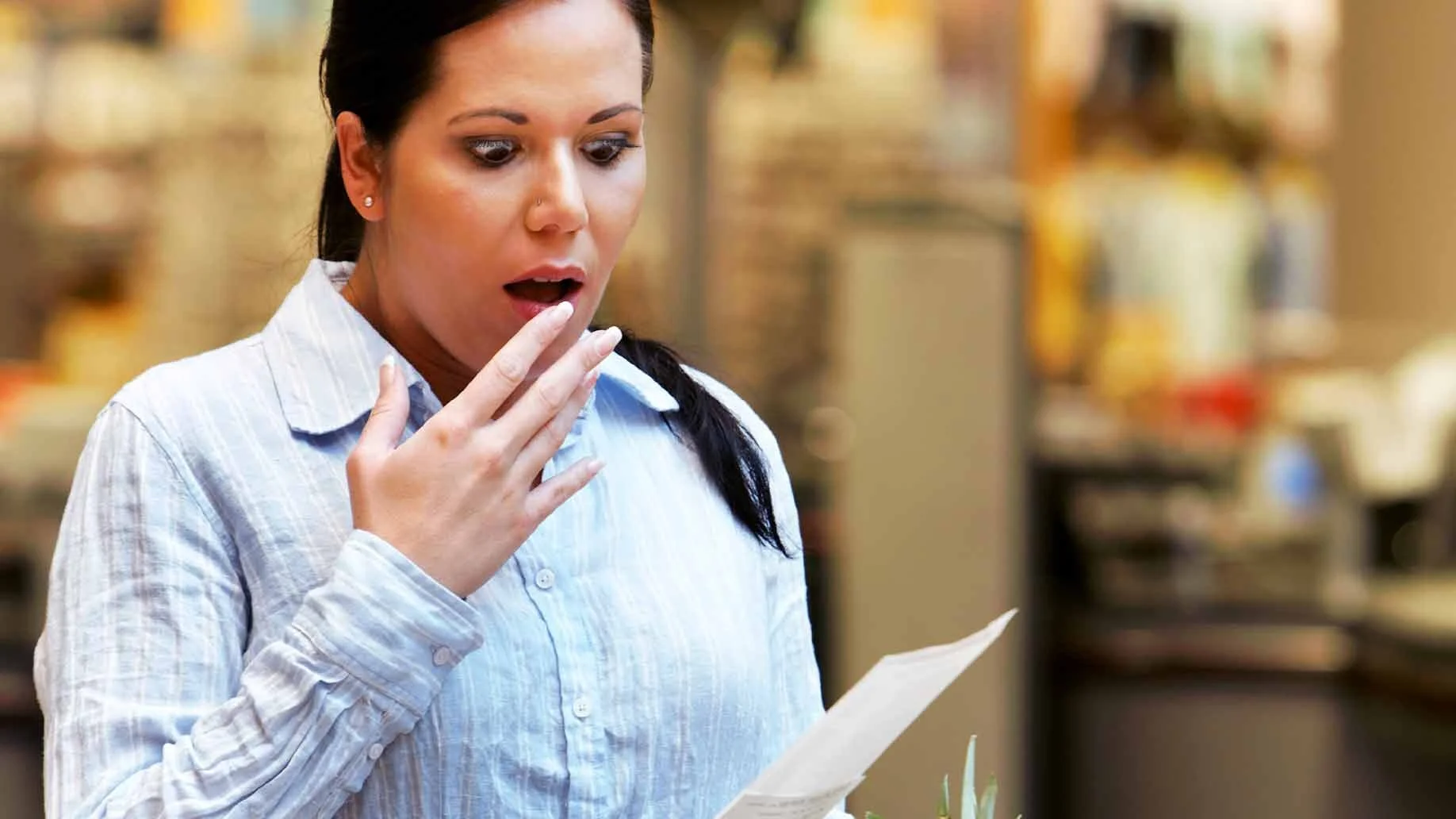 04-03-19-surprised-grocery-shopping-woman.jpg