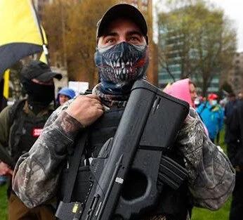 05-04-20-michigan-protester-cropped-e1588614878699.jpg