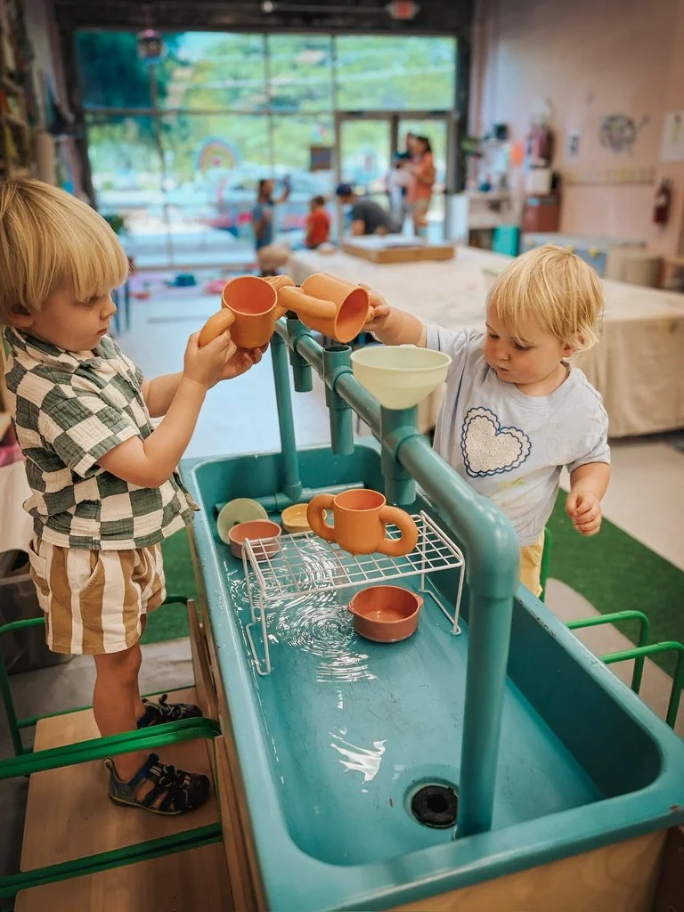 Water table play siblings (1).jpeg