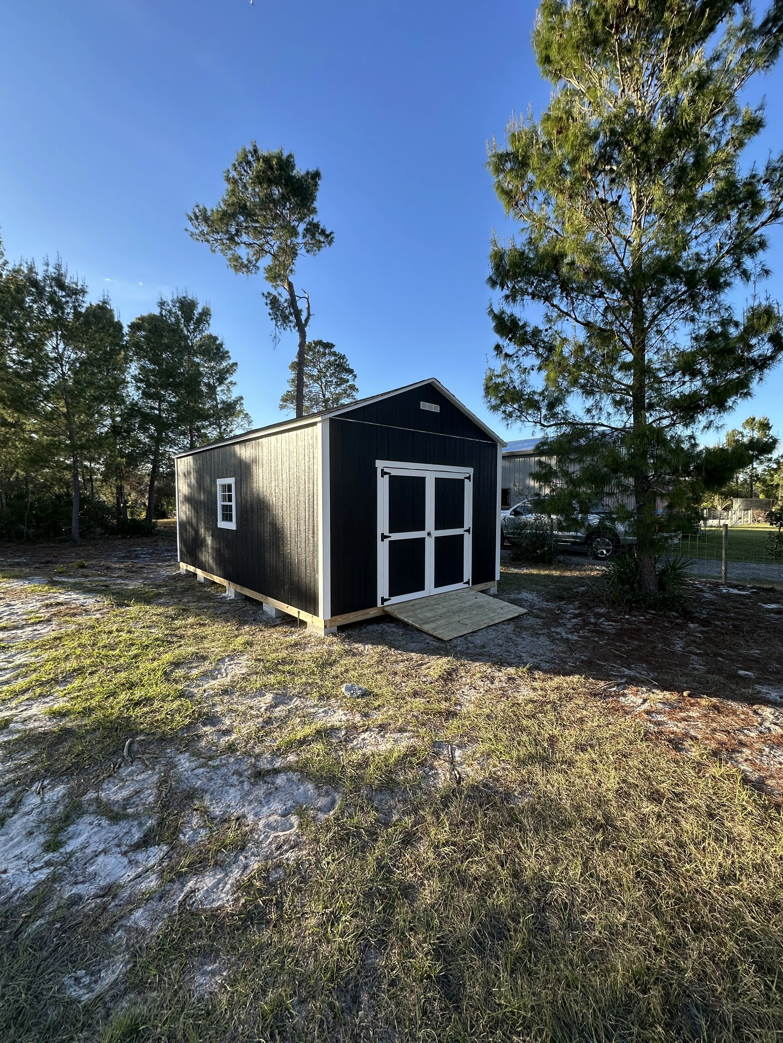 12x20 with 6ft Double doors, 6ft Heavy duty ramp and Custom paint job.