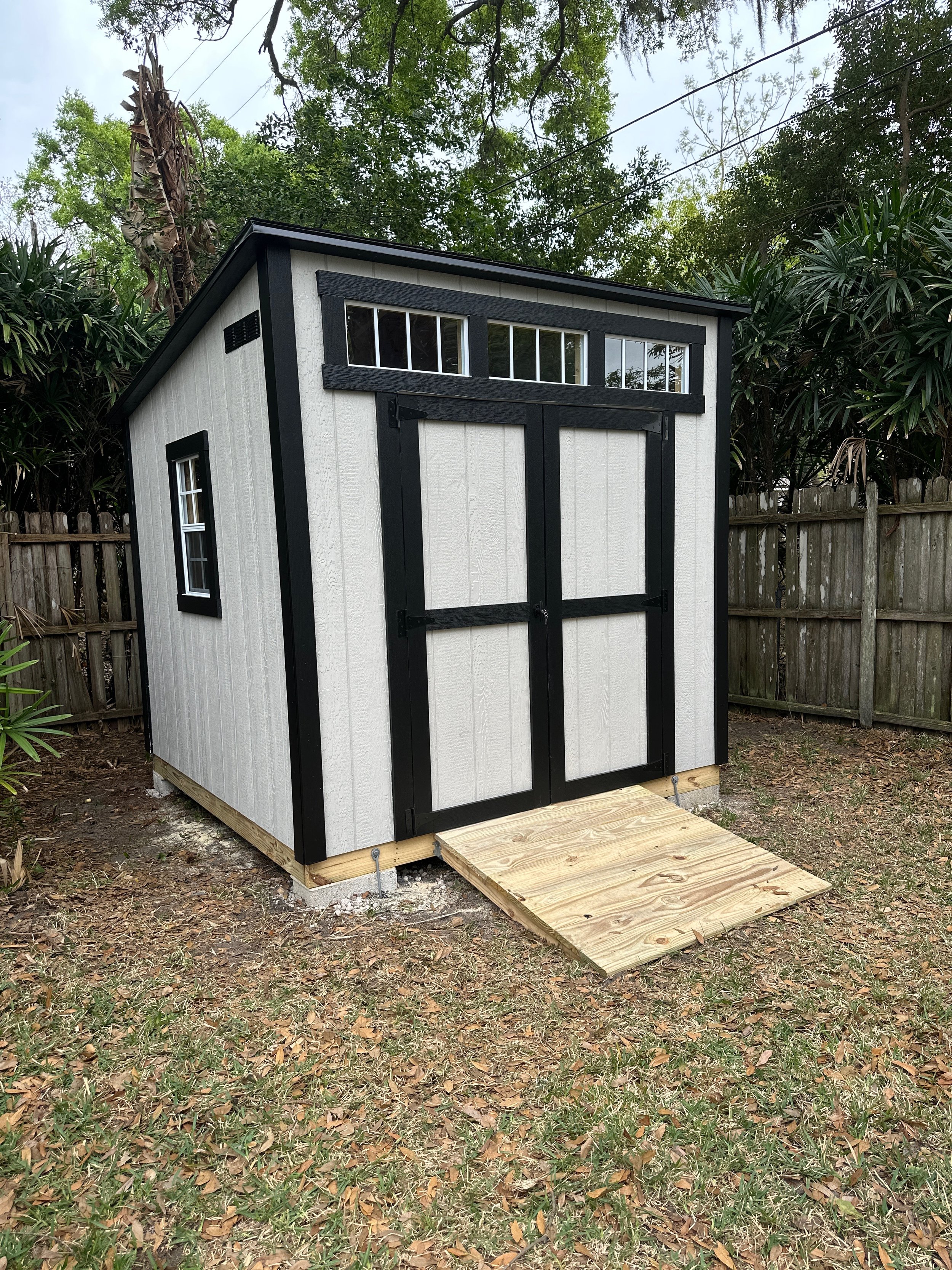 8x10 The Cove with Custom paint and Transom windows above door.