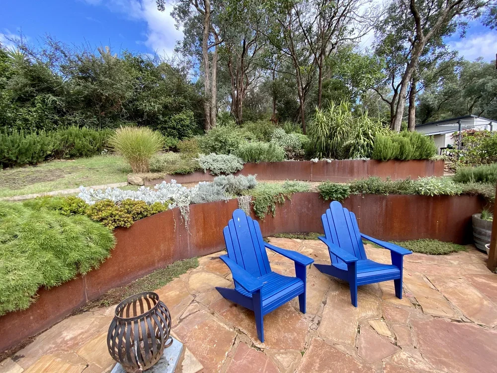 Custom built - onsite fabricated and wellded, corten steel retaining wall