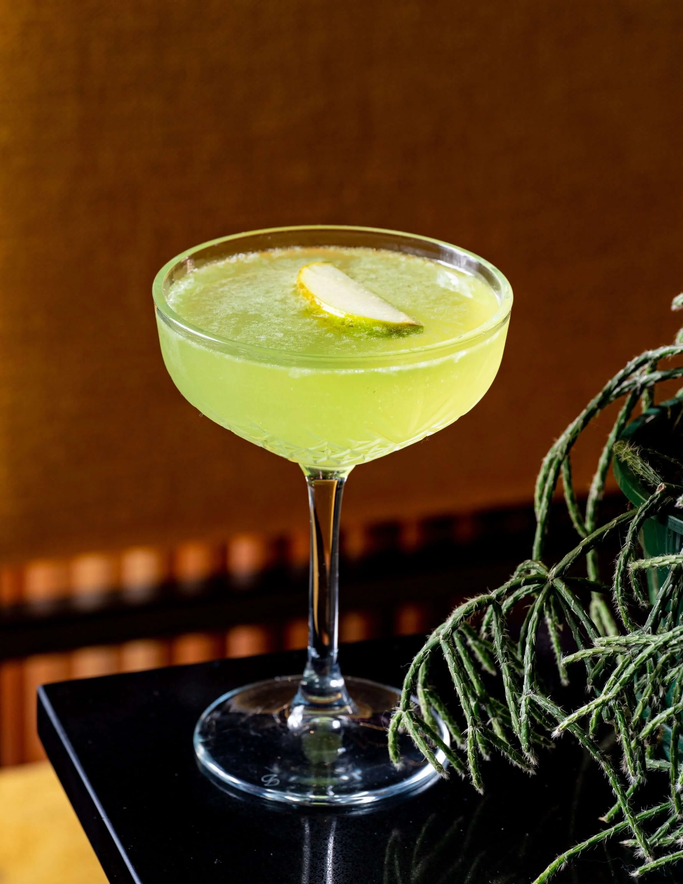  Gin Basil cocktail made with Hendricks gin, lemon juice, sugar, fresh basil 