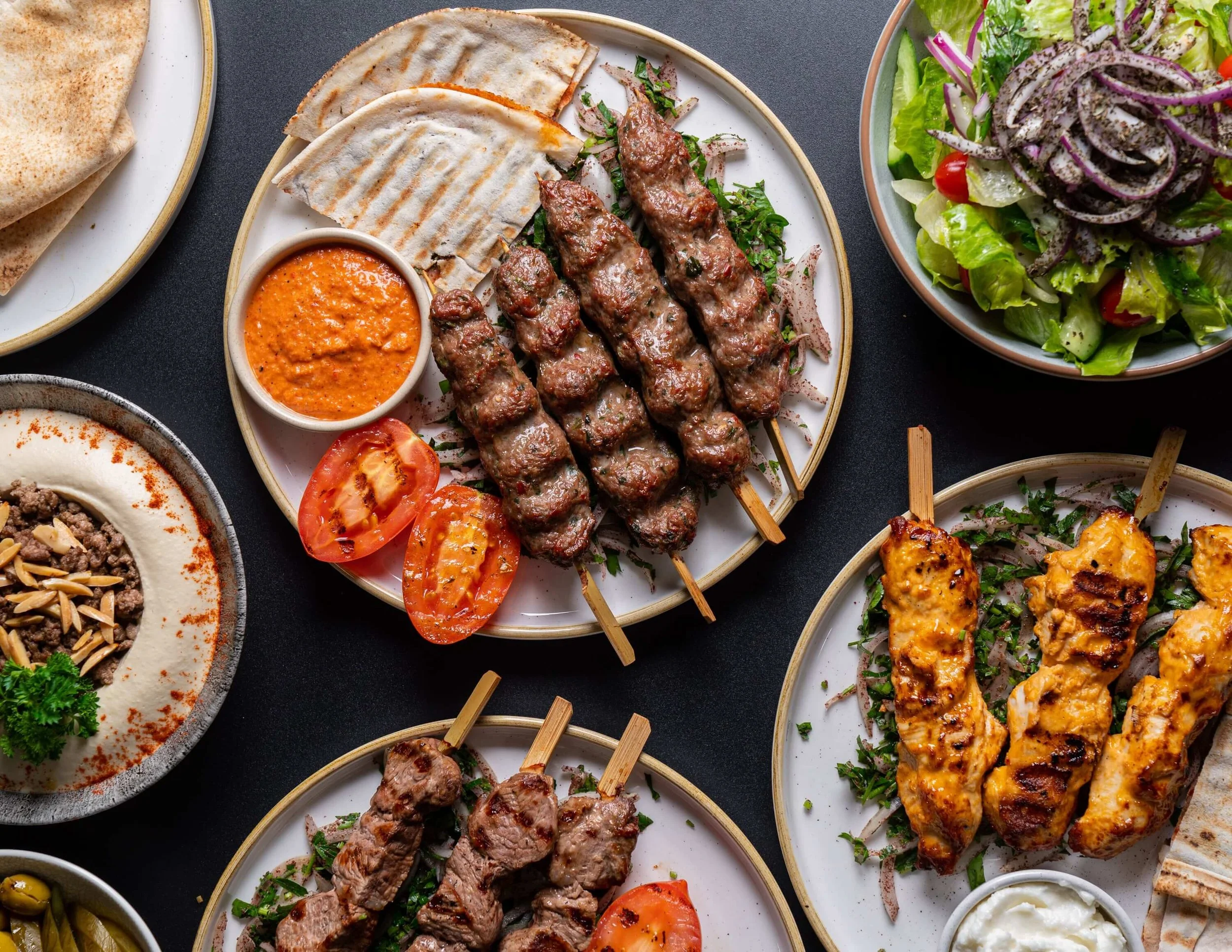  Skewers of kafta, laham mishwi &amp; shish tawook served w biwaz &amp; Jbeil sauce 