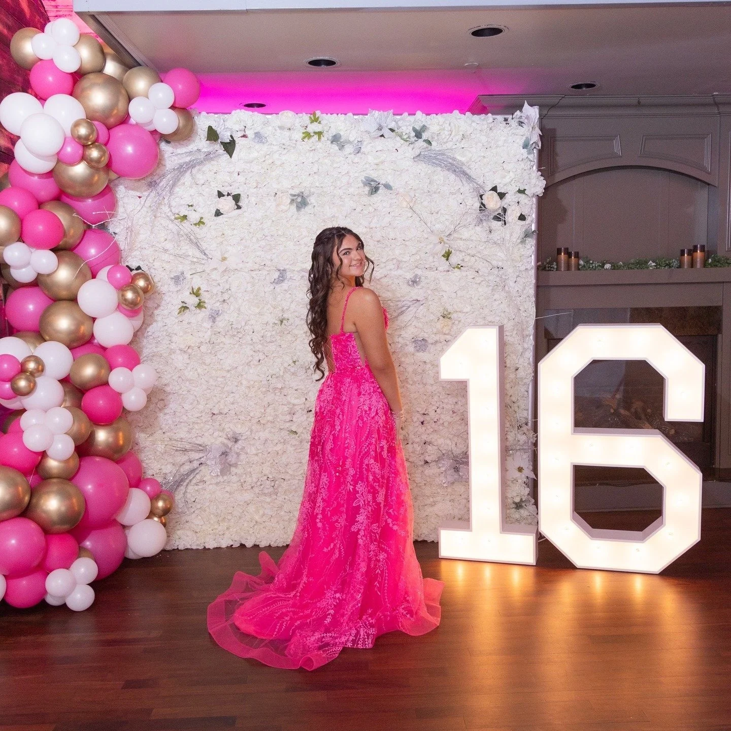 Celebrating Gabriella&rsquo;s Sweet 16 in style 💕 Pink and gold details, a candy bar full of treats, and a stunning floral photo backdrop made the night extra special.