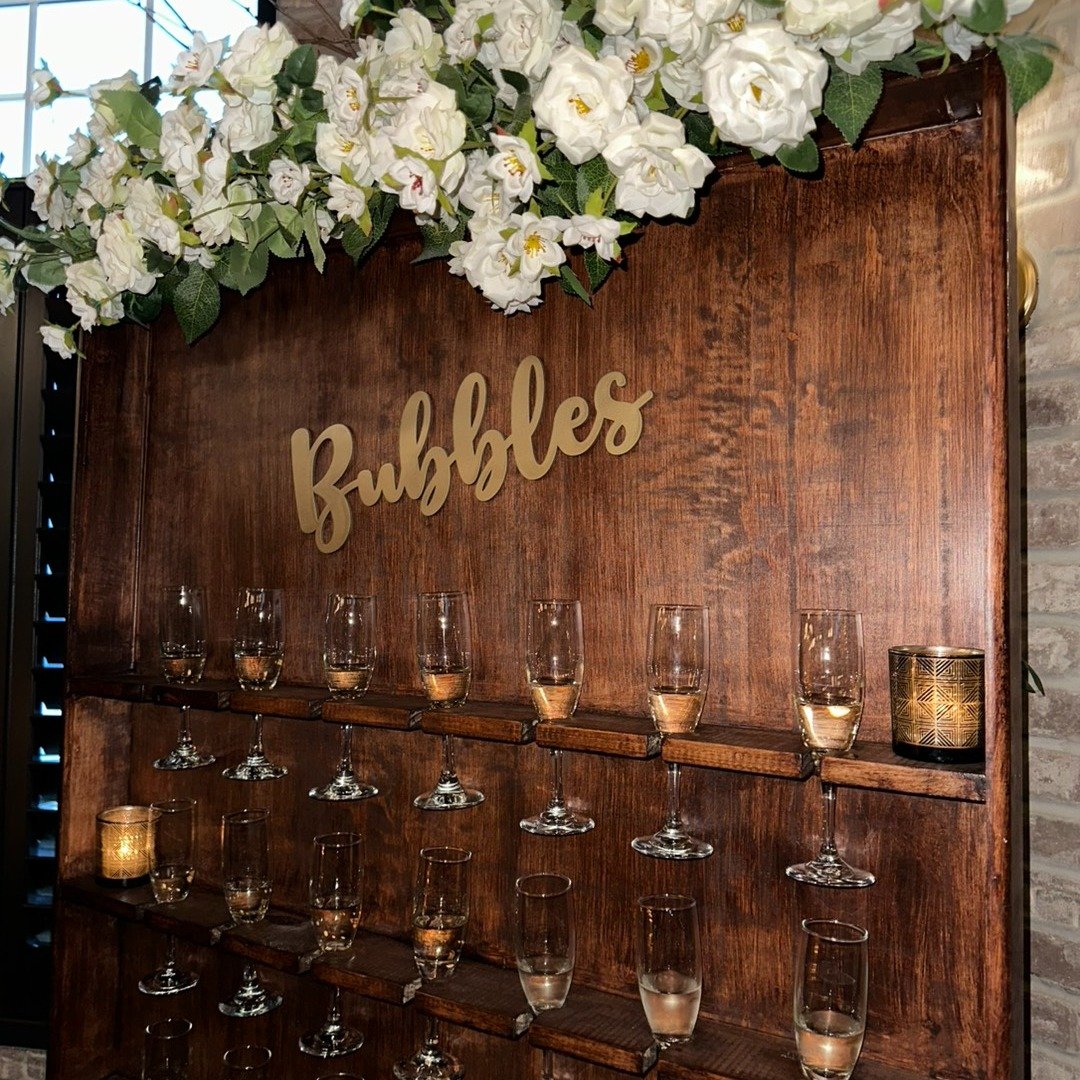 Elevate your next event at 618 Restaurant with our Champagne Wall &amp; Flower Wall rentals. Perfect for weddings, showers, birthdays, and celebrations, the Champagne Wall offers a stylish way to greet guests with bubbly while the Flower Wall creates