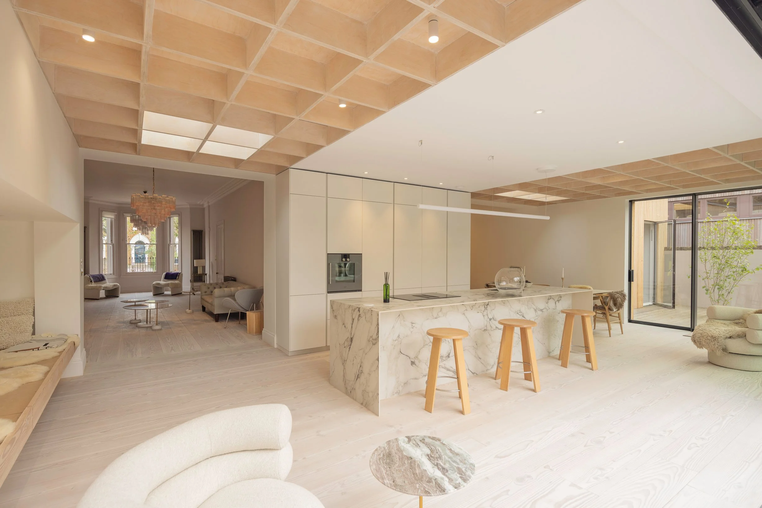 Plywood ceiling grid, marble kitchen island, Dinesen Flooring and rooflights