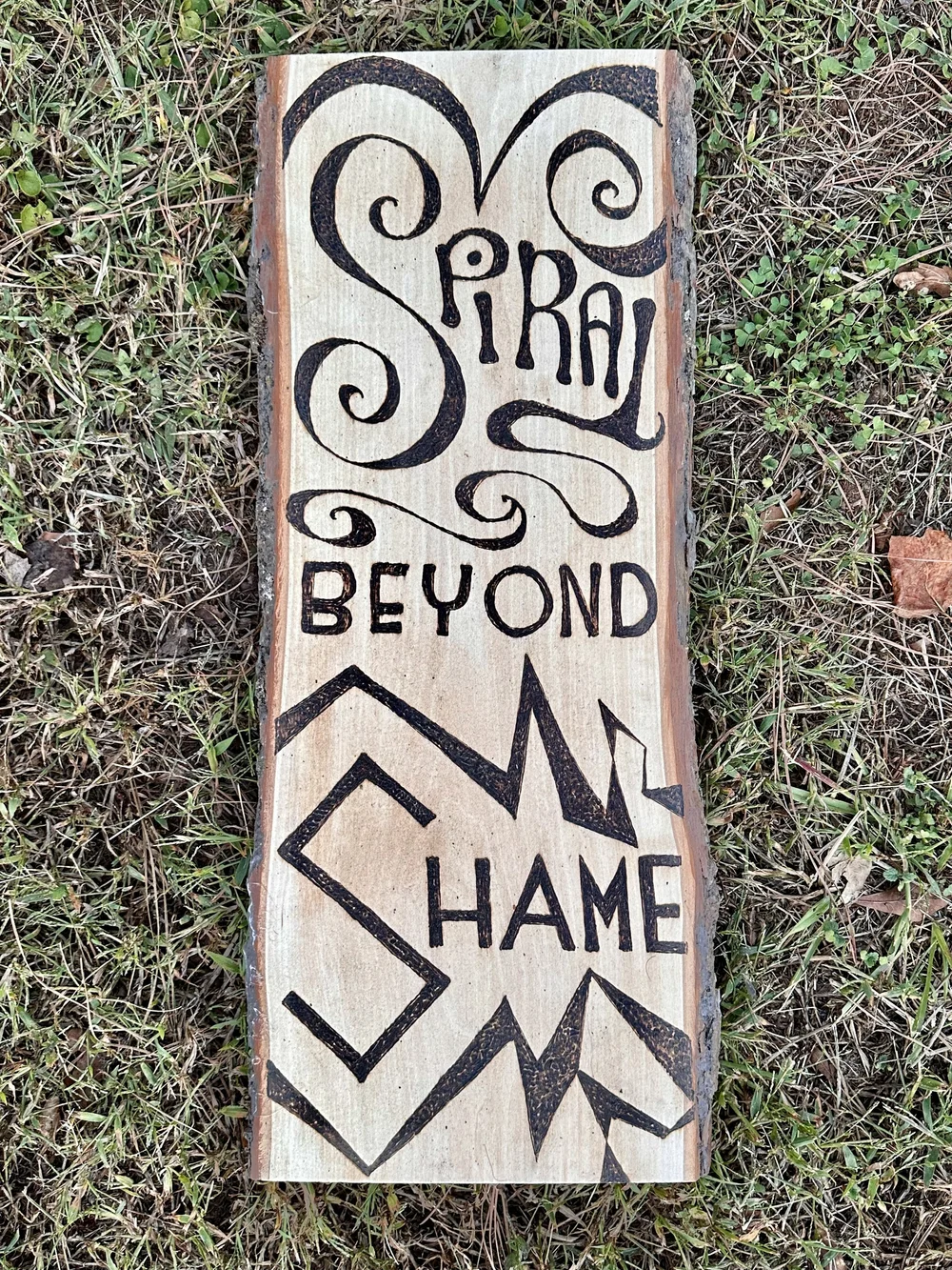 I drew freehand with the wood-burner