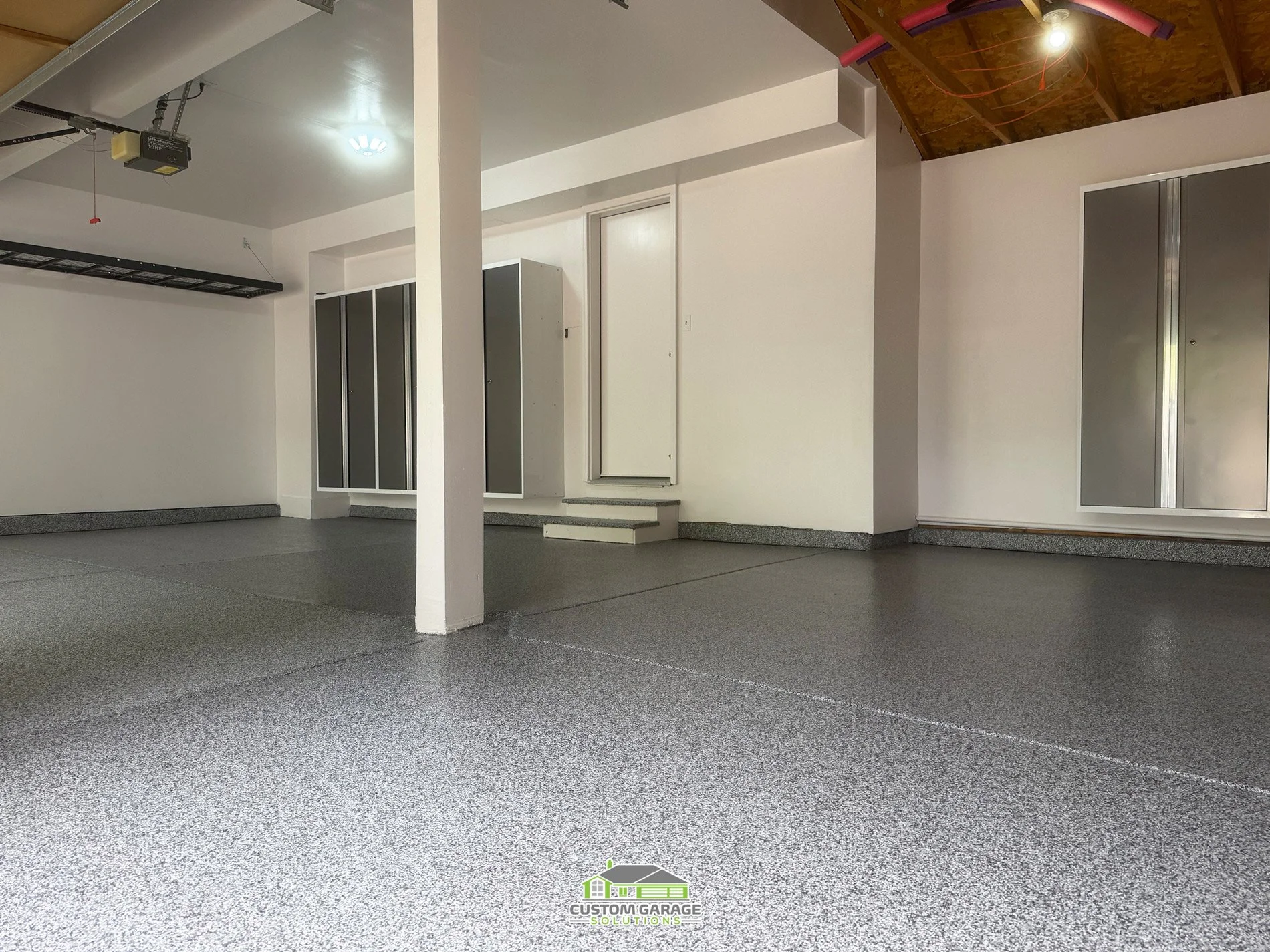 Colorado Garage Remodel - Flooring and mounted cabinets off the ground